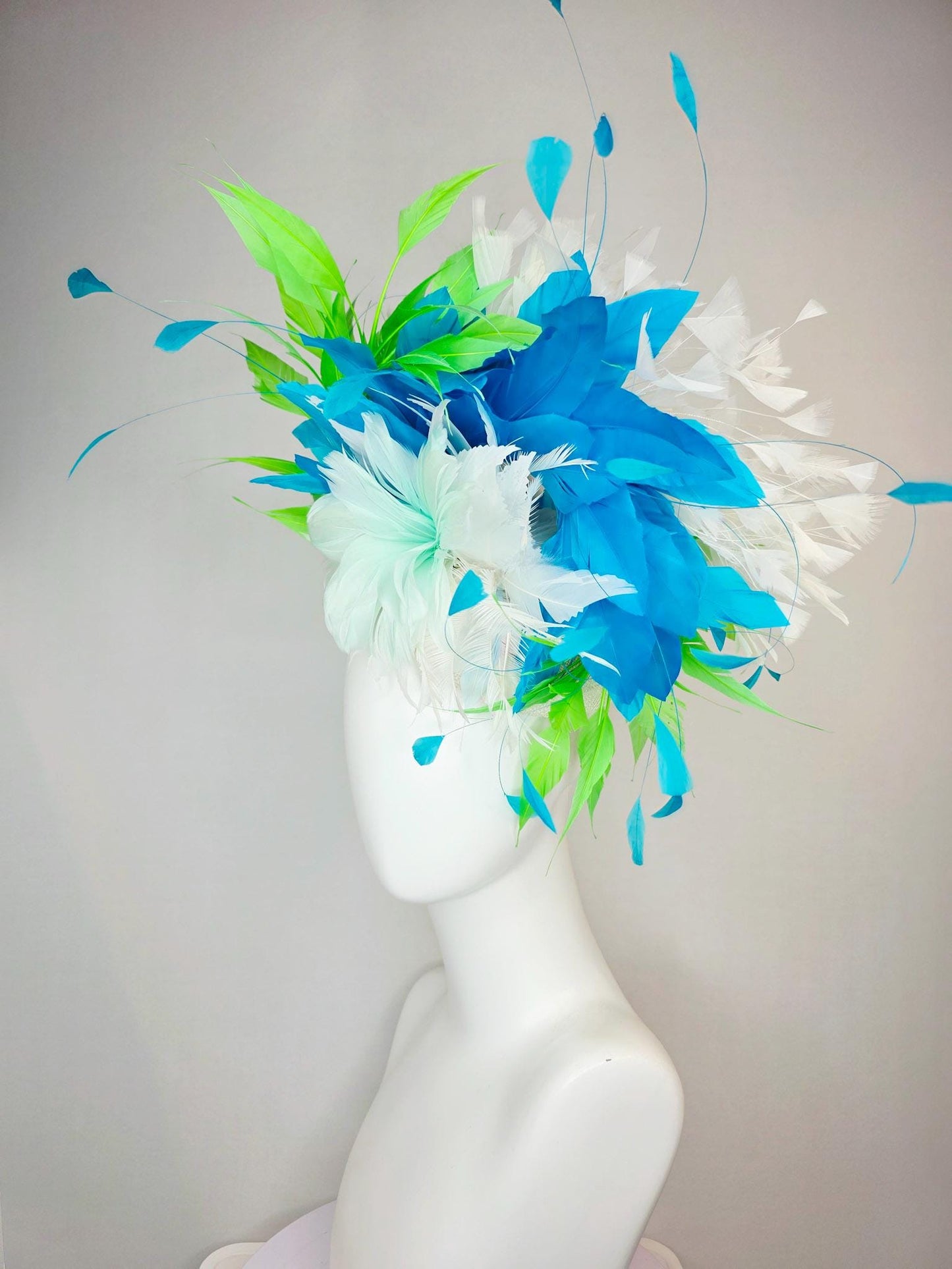 kentucky derby hat fascinator white light mint feather flower with turquoise blue lime green and white branching feathers