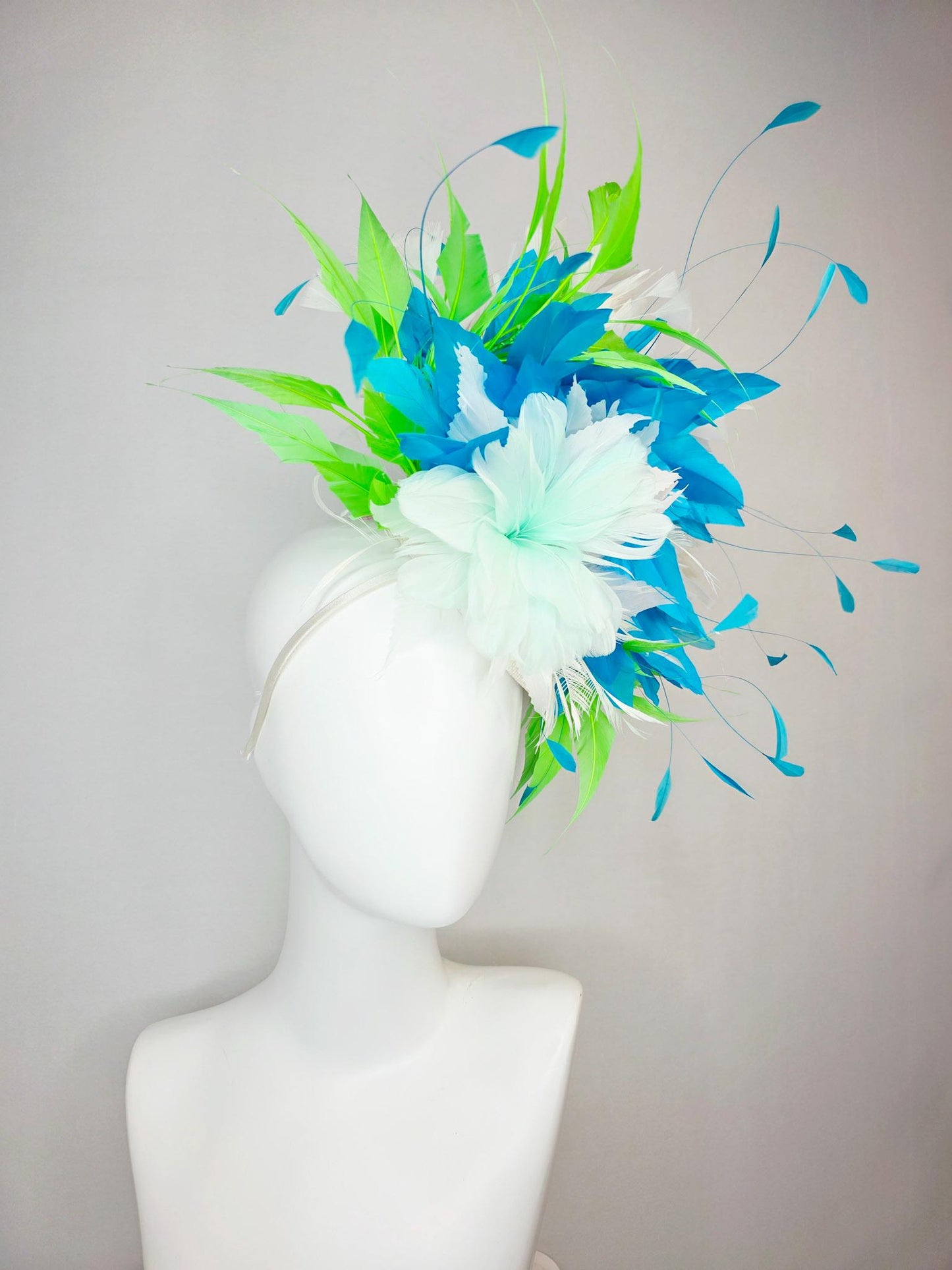 kentucky derby hat fascinator white light mint feather flower with turquoise blue lime green and white branching feathers