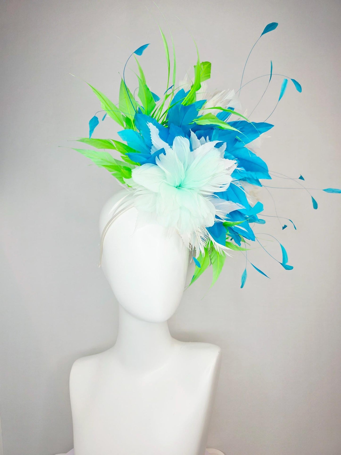 kentucky derby hat fascinator white light mint feather flower with turquoise blue lime green and white branching feathers