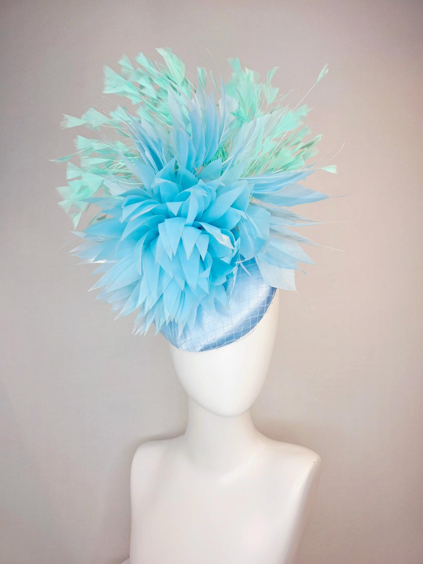 kentucky derby hat fascinator light baby blue satin with netting fluffy sky blue feathers and mint green branching feathers