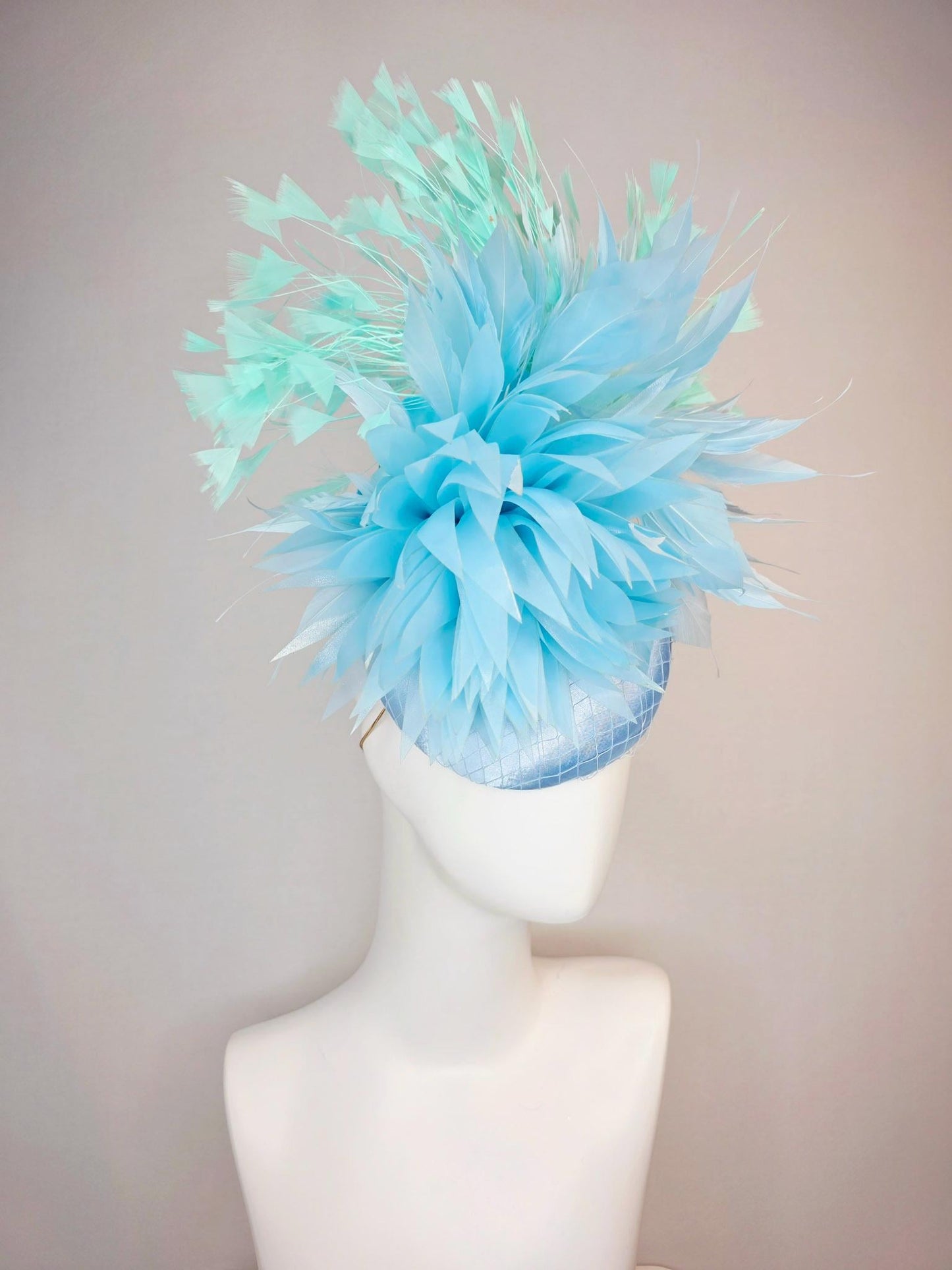 kentucky derby hat fascinator light baby blue satin with netting fluffy sky blue feathers and mint green branching feathers