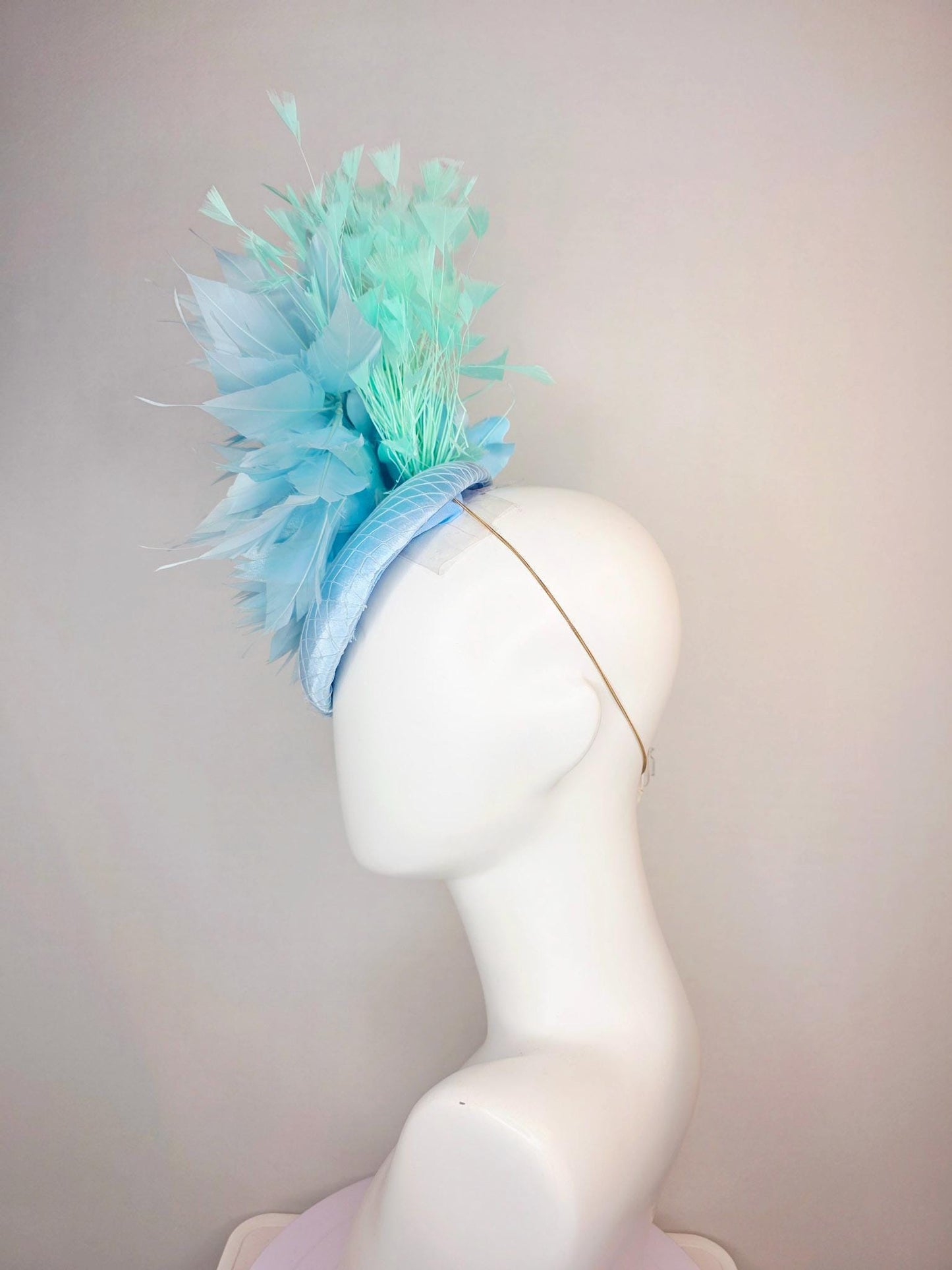 kentucky derby hat fascinator light baby blue satin with netting fluffy sky blue feathers and mint green branching feathers