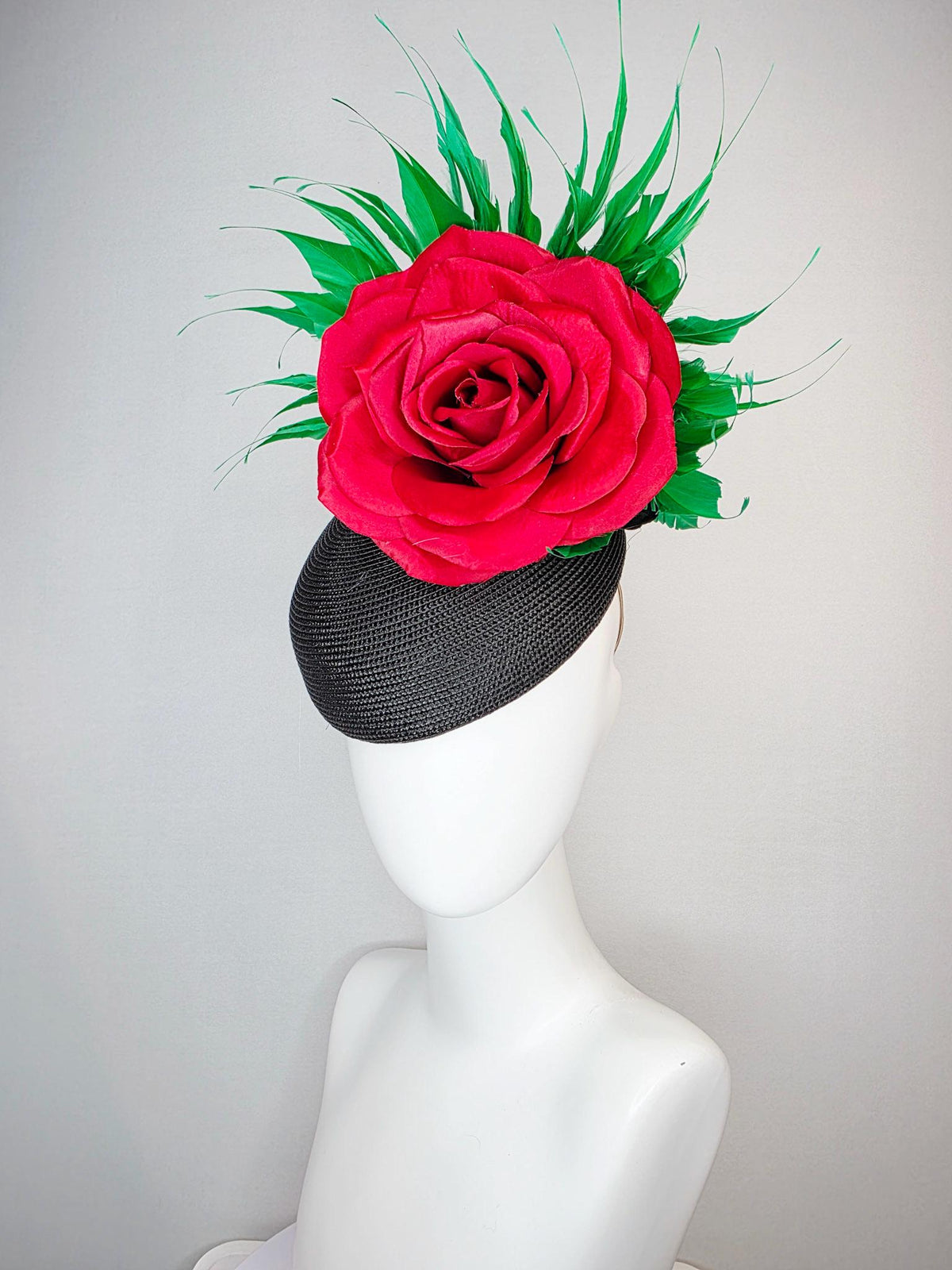 kentucky derby hat fascinator black straw base with large cherry red satin rose and bright green branching feathers
