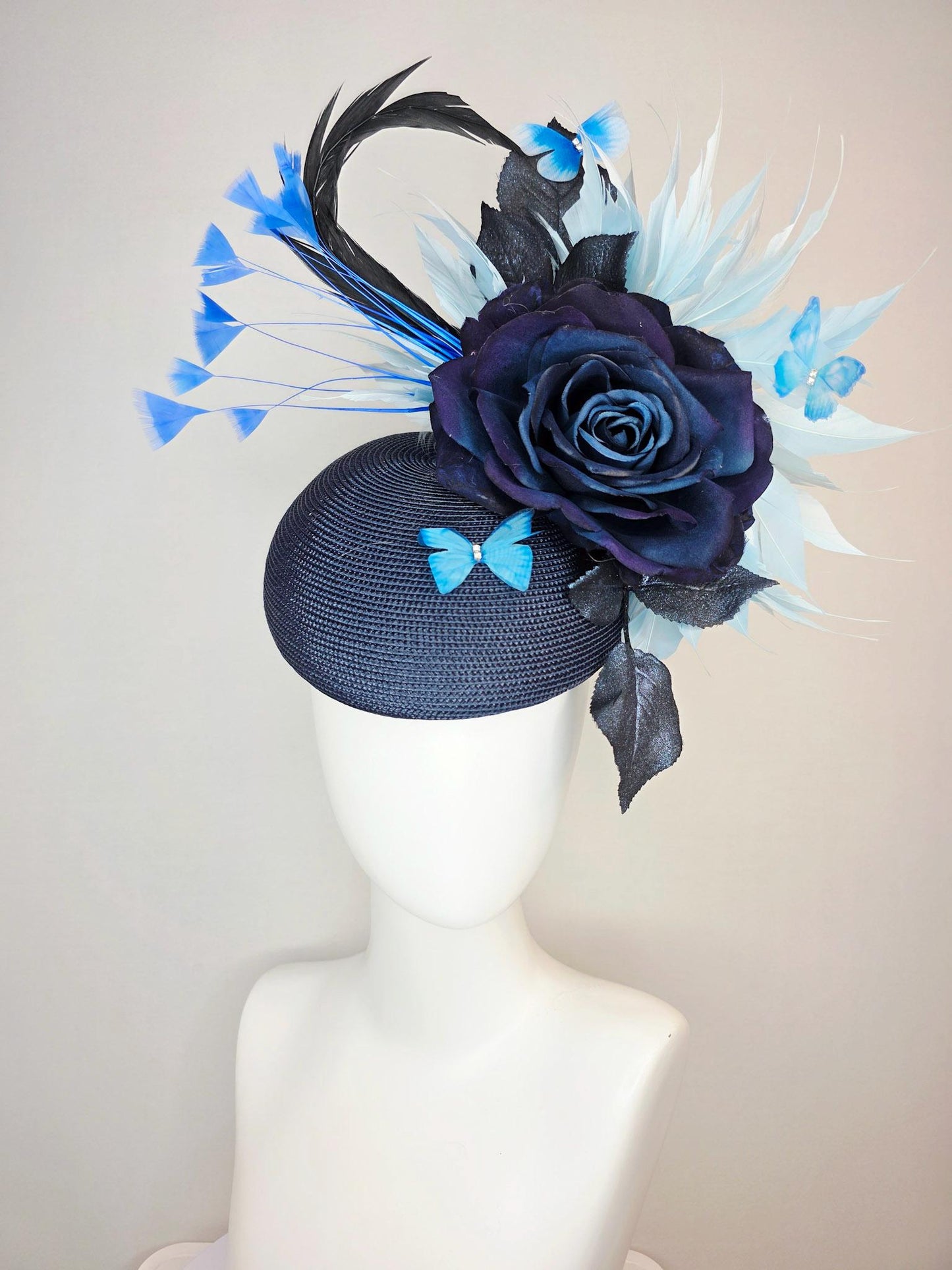 kentucky derby hat fascinator navy blue straw base large navy blue silk rose black leaves sky and baby blue feathers blue butterflies