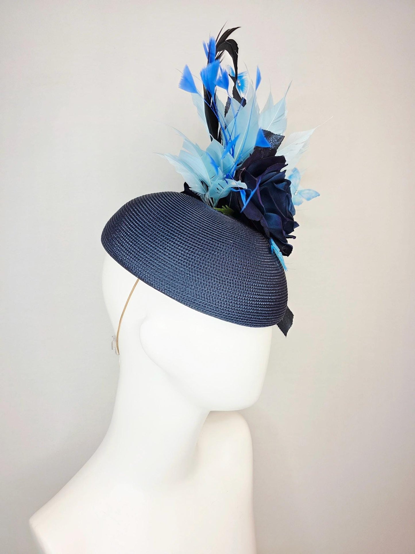 kentucky derby hat fascinator navy blue straw base large navy blue silk rose black leaves sky and baby blue feathers blue butterflies