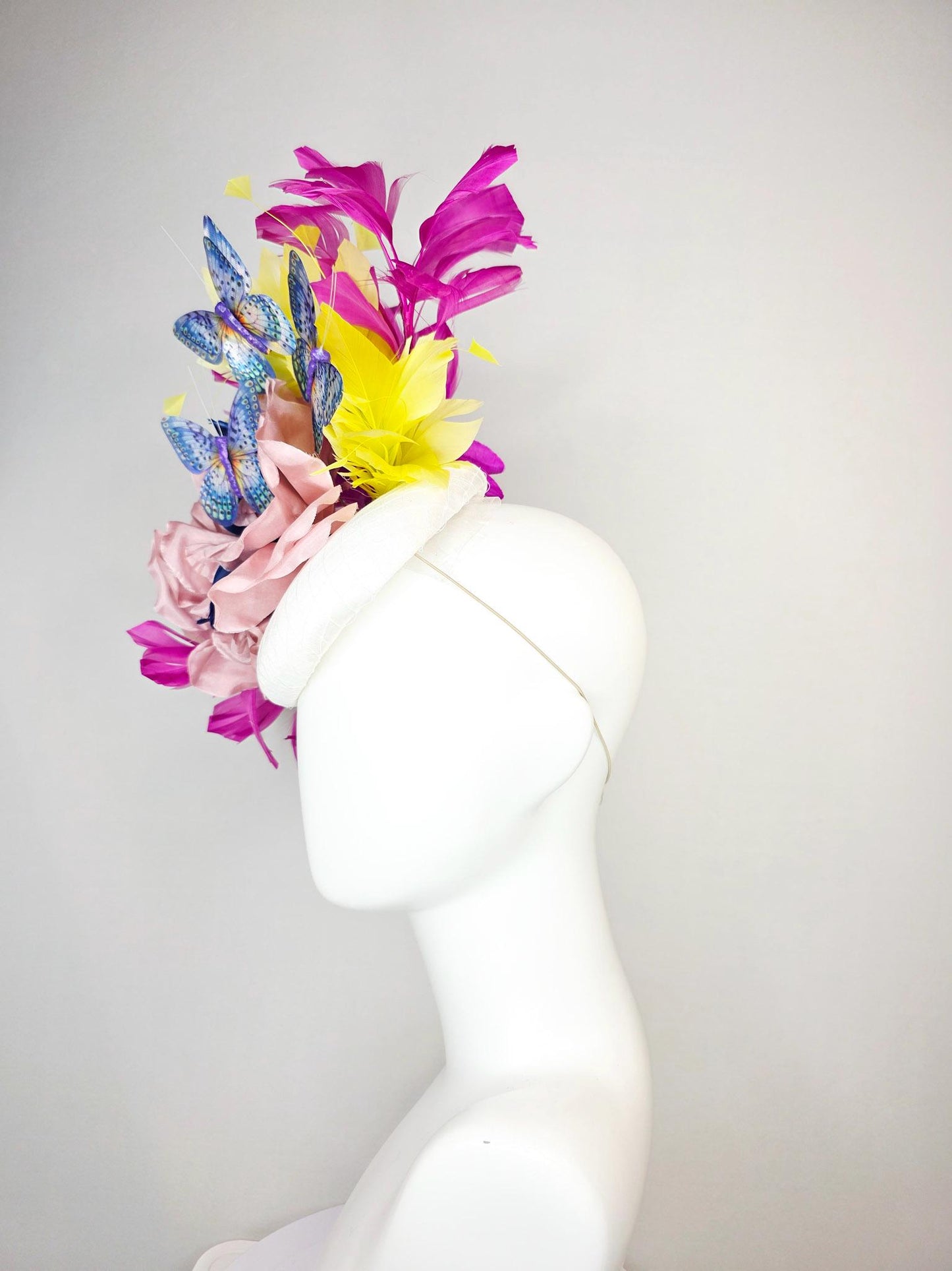 kentucky derby hat fascinator white silk with netting light pink silk roses yellow and magenta purple feathers and purple blue butterflies