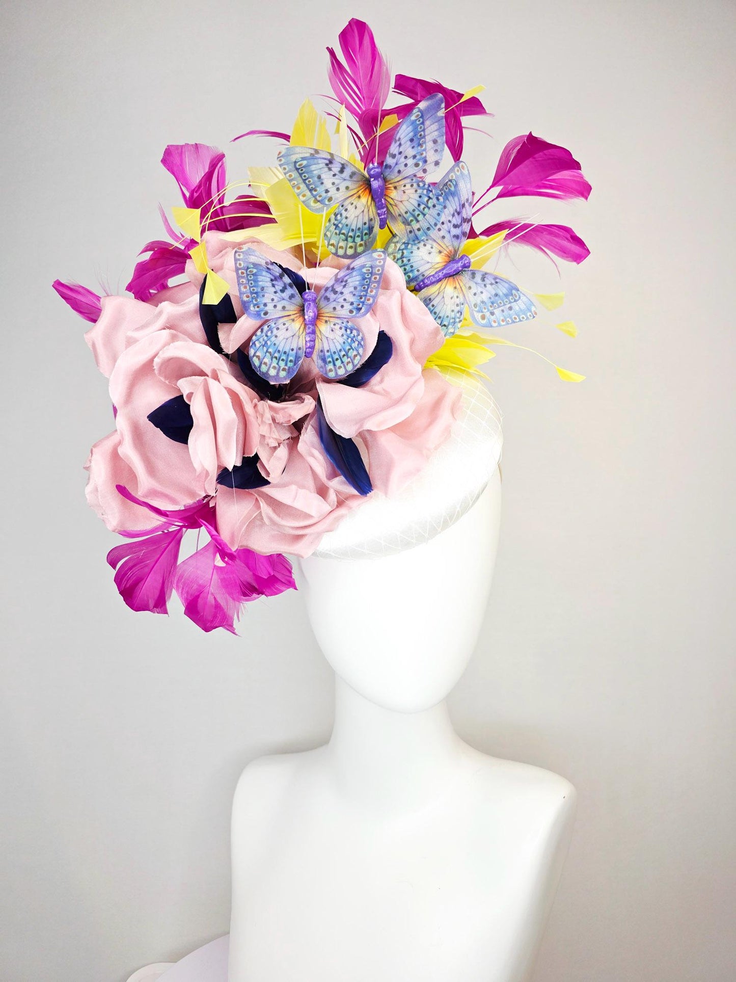 kentucky derby hat fascinator white silk with netting light pink silk roses yellow and magenta purple feathers and purple blue butterflies