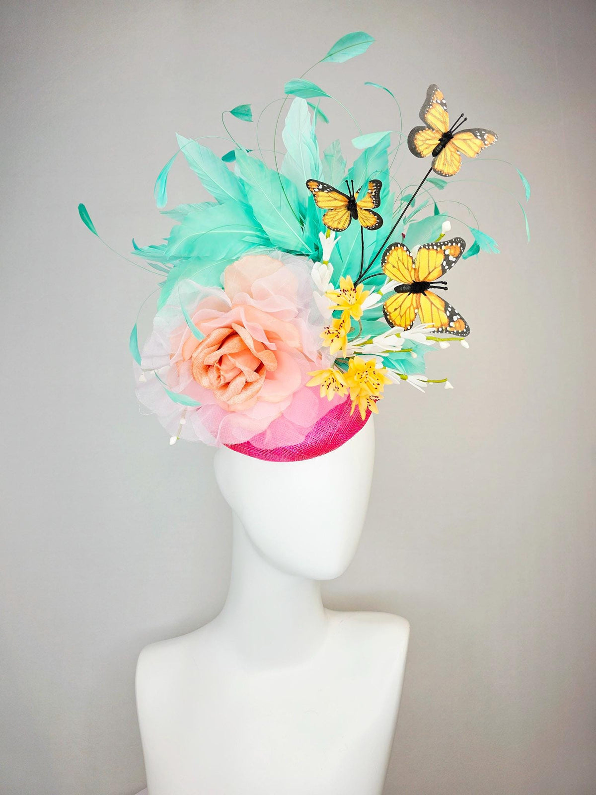 kentucky derby hat fascinator hot pink sinamay with peach organza rose yellow and white flowers green mint feathers and yellow butterflies