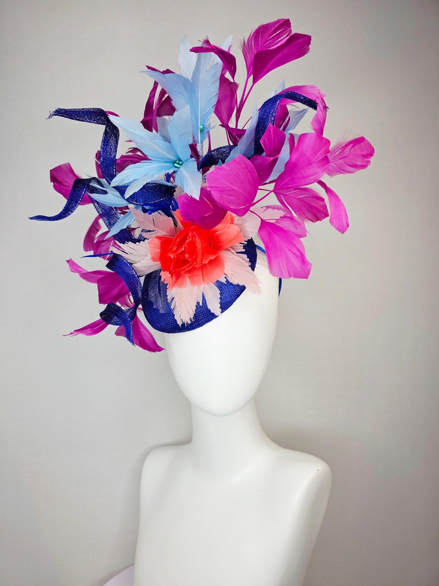 kentucky derby hat fascinator cobalt blue sinamay with curls coral red and sky light blue feather flowers magenta pink branching feathers
