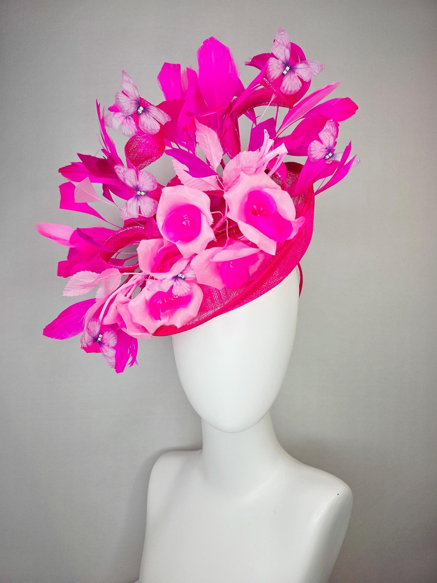kentucky derby hat fascinator hot pink sinamay saucer blush pink satin flowers light pink leaves bright pink fuchsia feathers butterflies