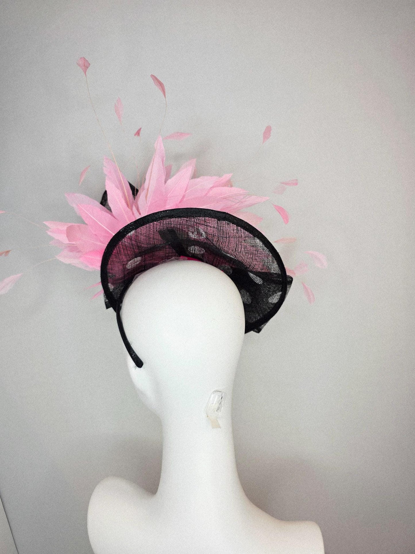 kentucky derby hat fascinator black and white polka dot sinamay saucer with black sinamay bow and light baby pink branching feathers