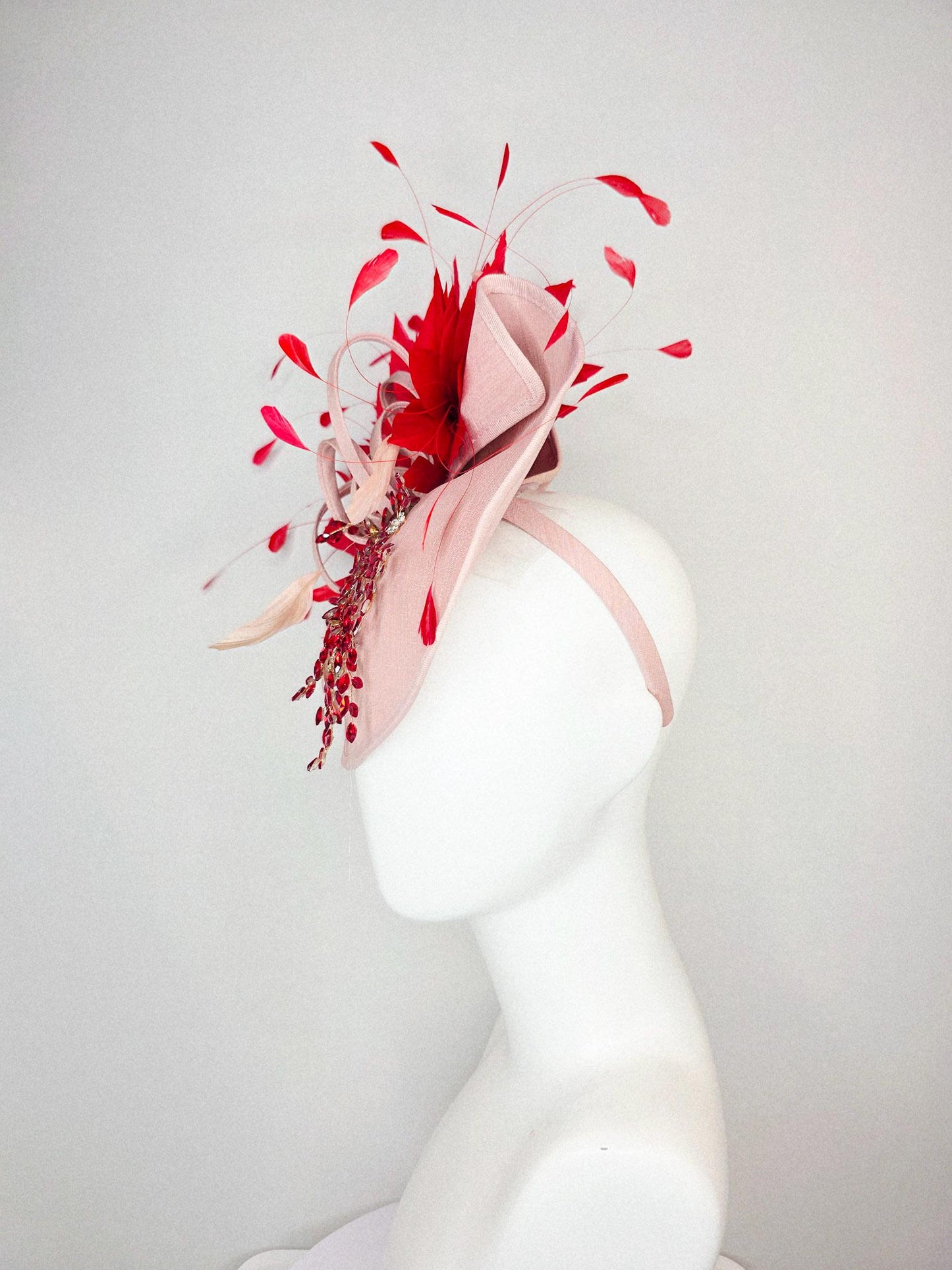 kentucky derby hat fascinator champagne pink shantung saucer with crystal red leaf vine shantung curls and scarlet red branching feathers