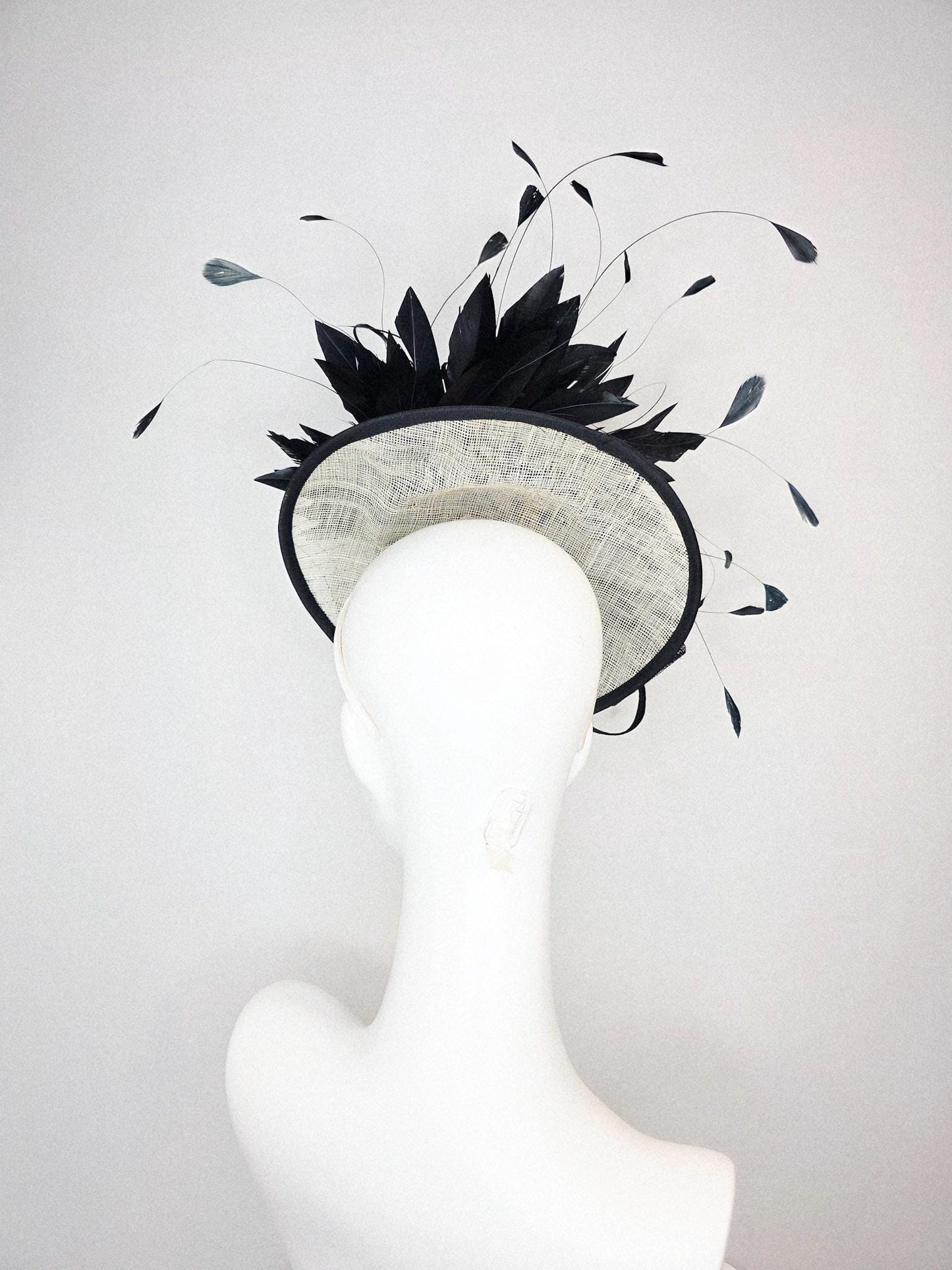 kentucky derby hat fascinator ivory white sinamay saucer with black netting and black sinamay trim and bow and black branching feathers