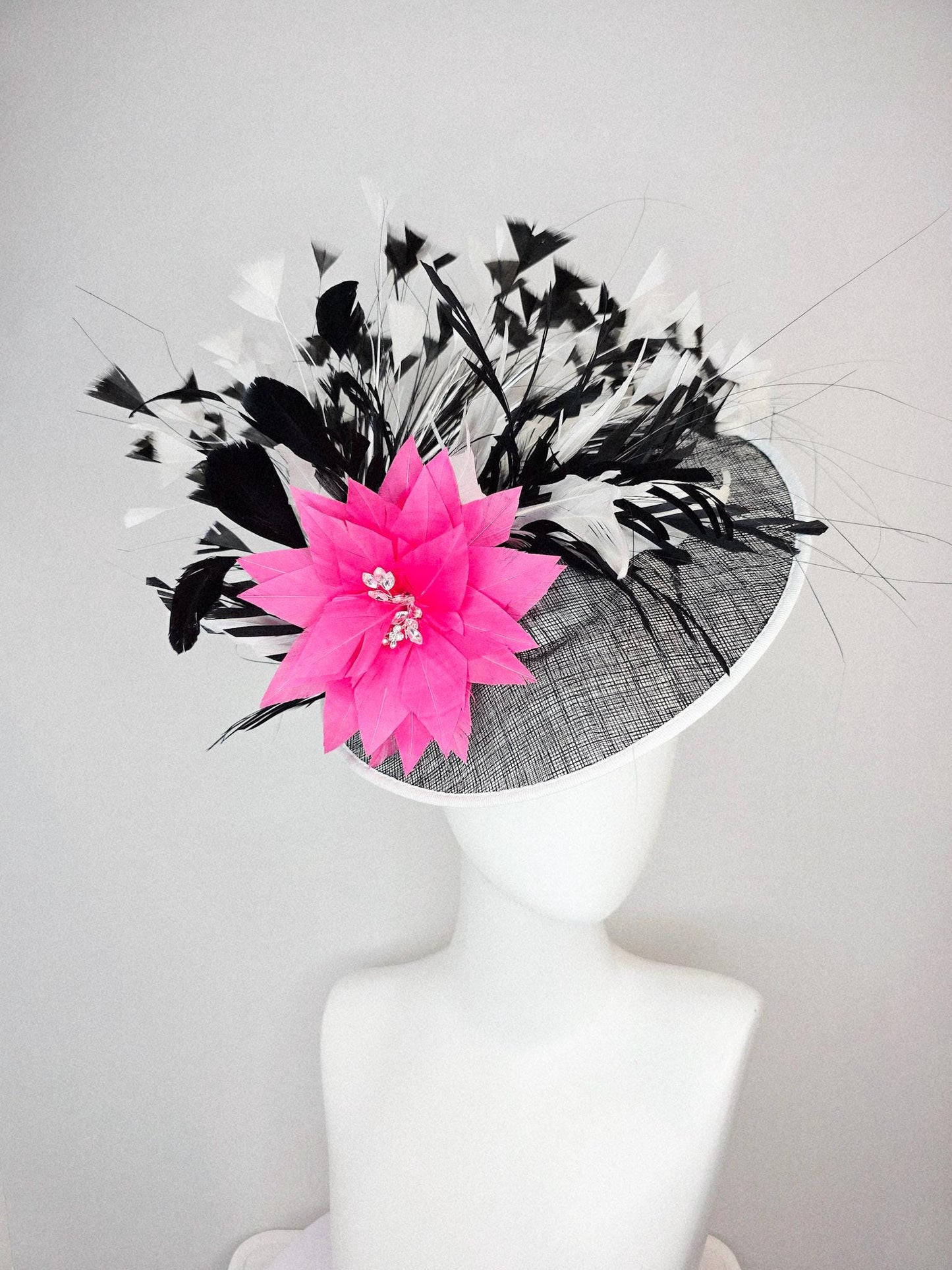 kentucky derby hat fascinator black and white sinamay saucer with white sinamay trim pink feather flower black and white branching feathers