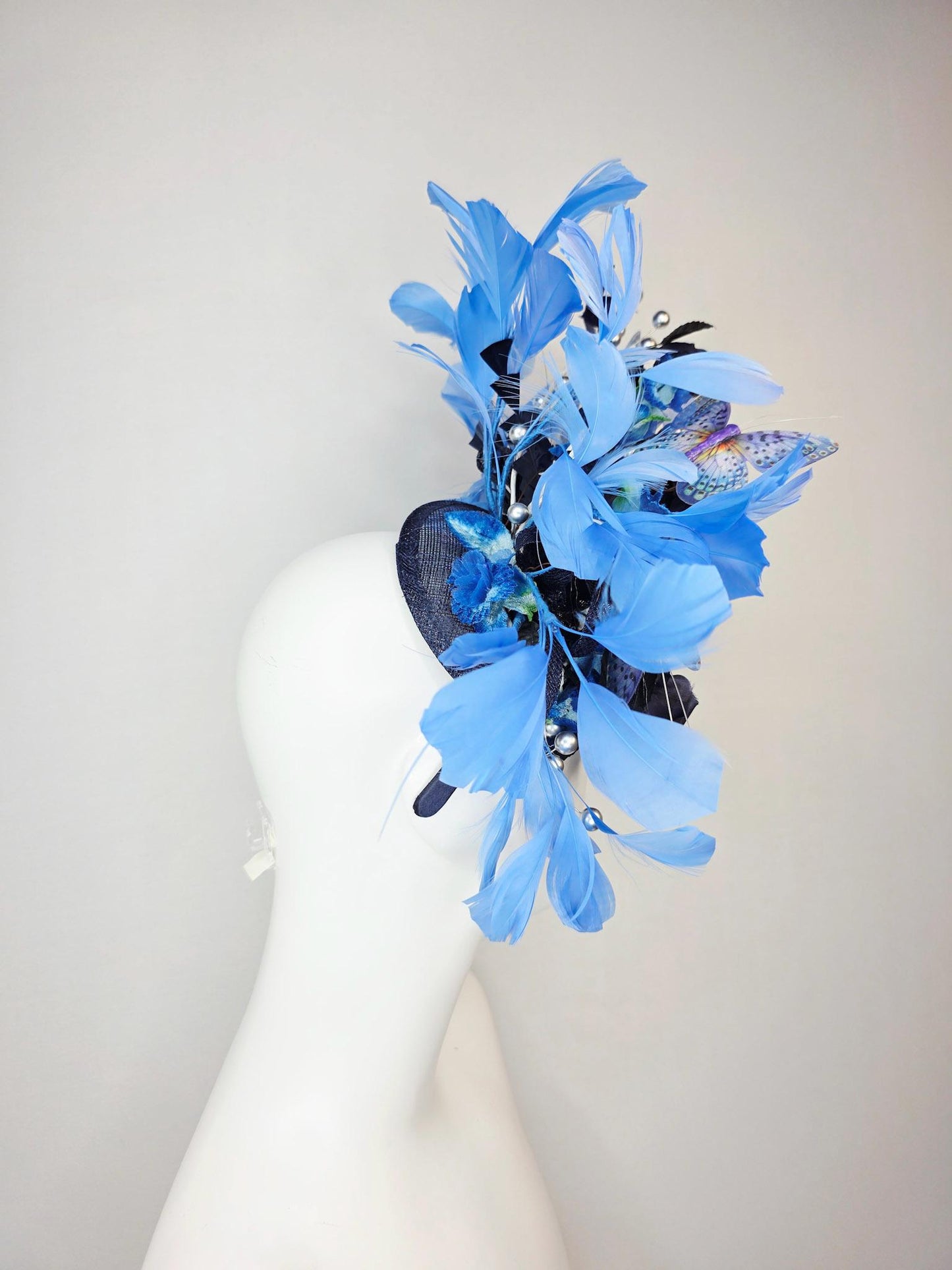 kentucky derby hat fascinator navy blue satin roses black leaves royal blue sky blue feathers silver pearls lavender purple blue butterflies