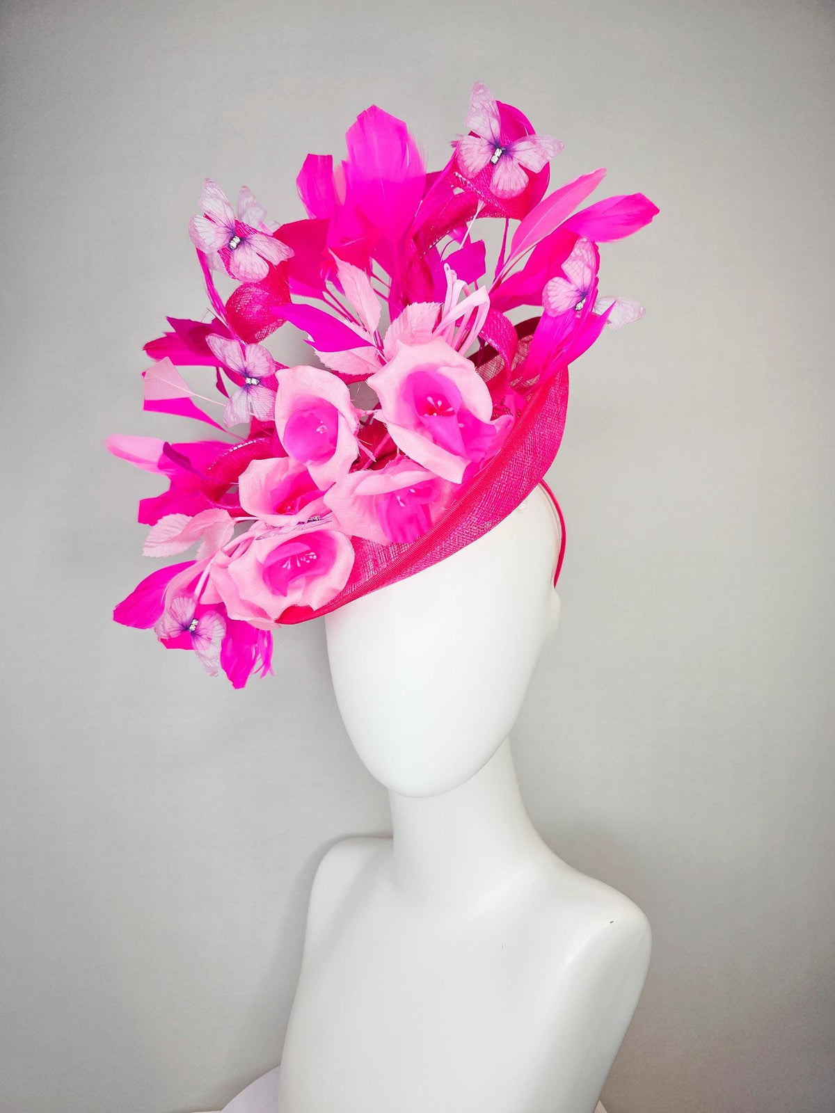kentucky derby hat fascinator hot pink sinamay saucer blush pink satin flowers light pink leaves bright pink fuchsia feathers butterflies