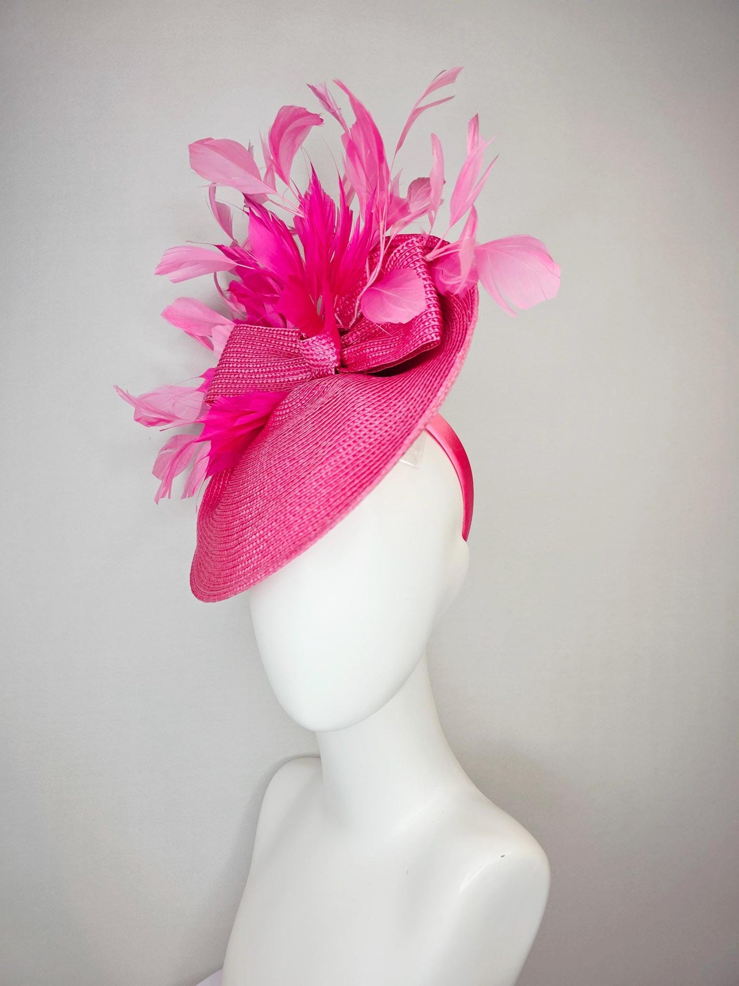 kentucky derby hat fascinator hot pink straw saucer with pink straw bow and fuchsia and blush pink branching feathers