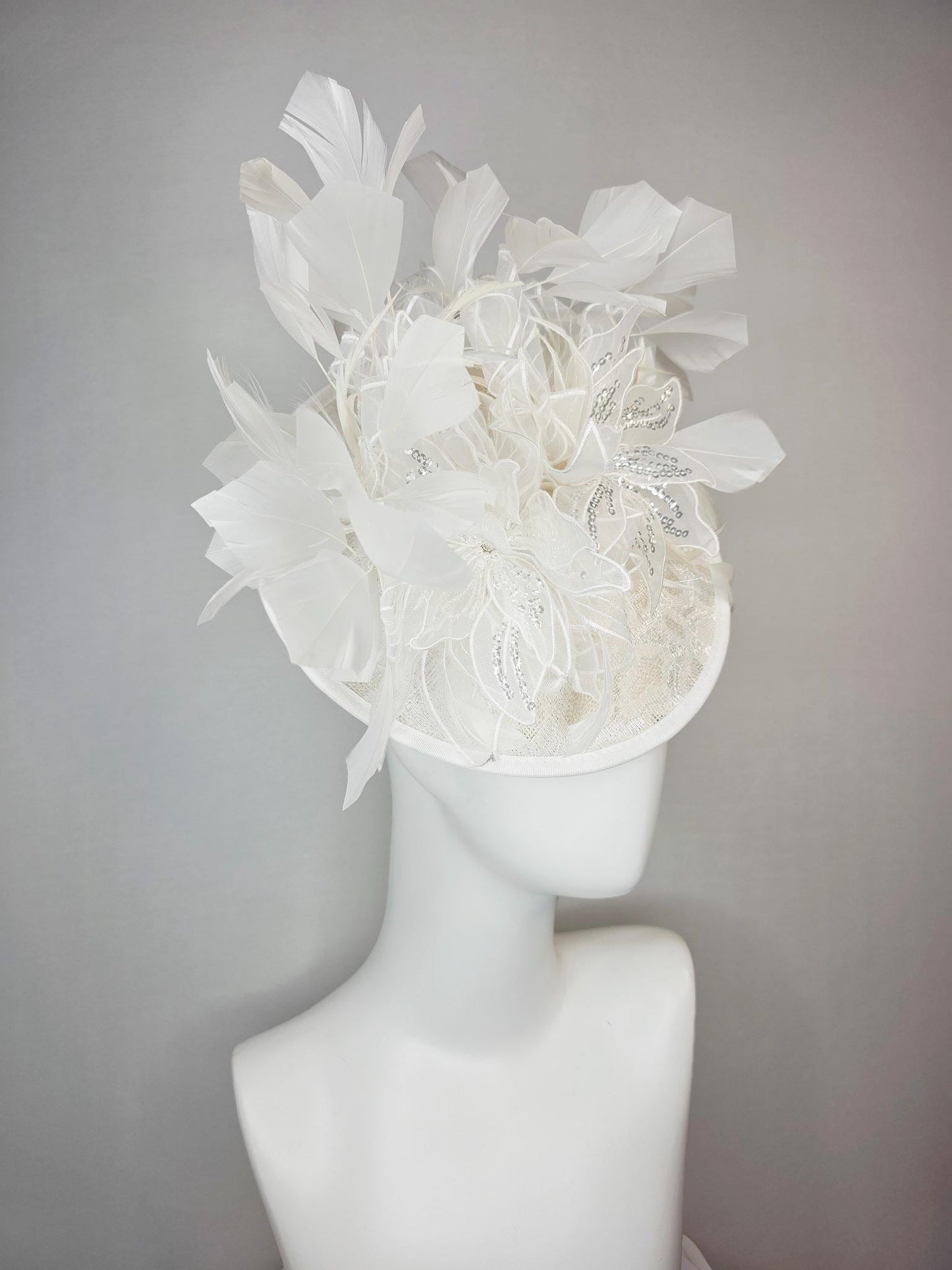 kentucky derby hat fascinator neutral ivory white sinamay saucer with white organza flowers with silver sequins and white branching feathers