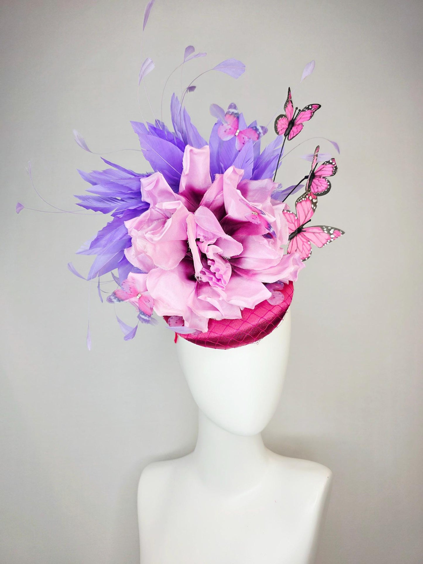 kentucky derby hat fascinator pink satin with netting large lilac purple satin flower lavender purple feathers and pink butterflies