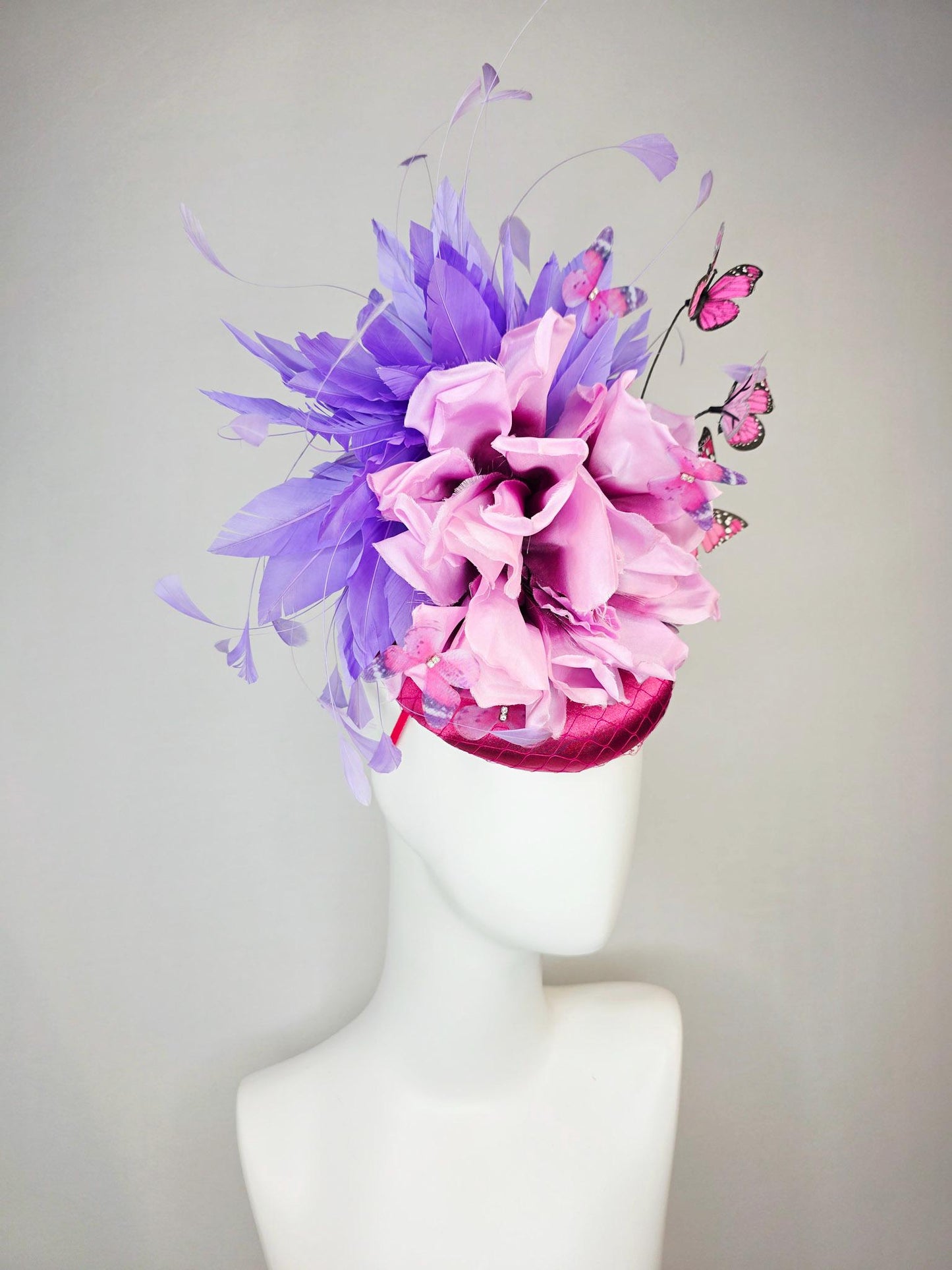 kentucky derby hat fascinator pink satin with netting large lilac purple satin flower lavender purple feathers and pink butterflies