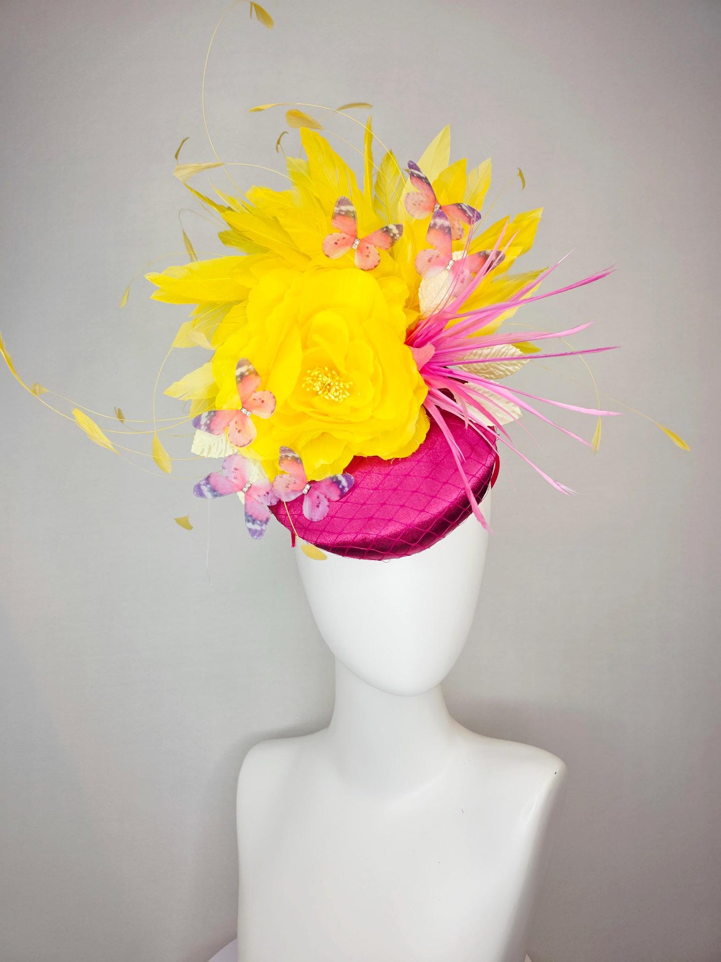 kentucky derby hat fascinator hot pink satin with netting yellow satin rose white leaves pink feather flower yellow feathers and butterflies