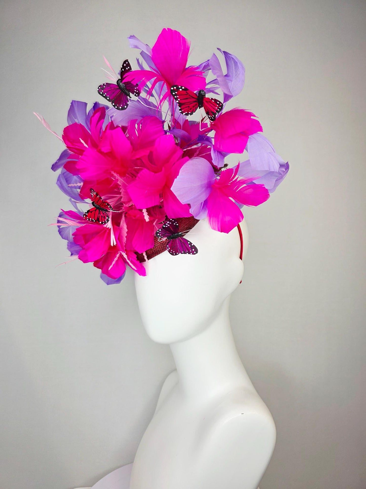kentucky derby hat fascinator burgundy red sinamay fuchsia pink lavender purple branching feathers red and dark pink butterflies