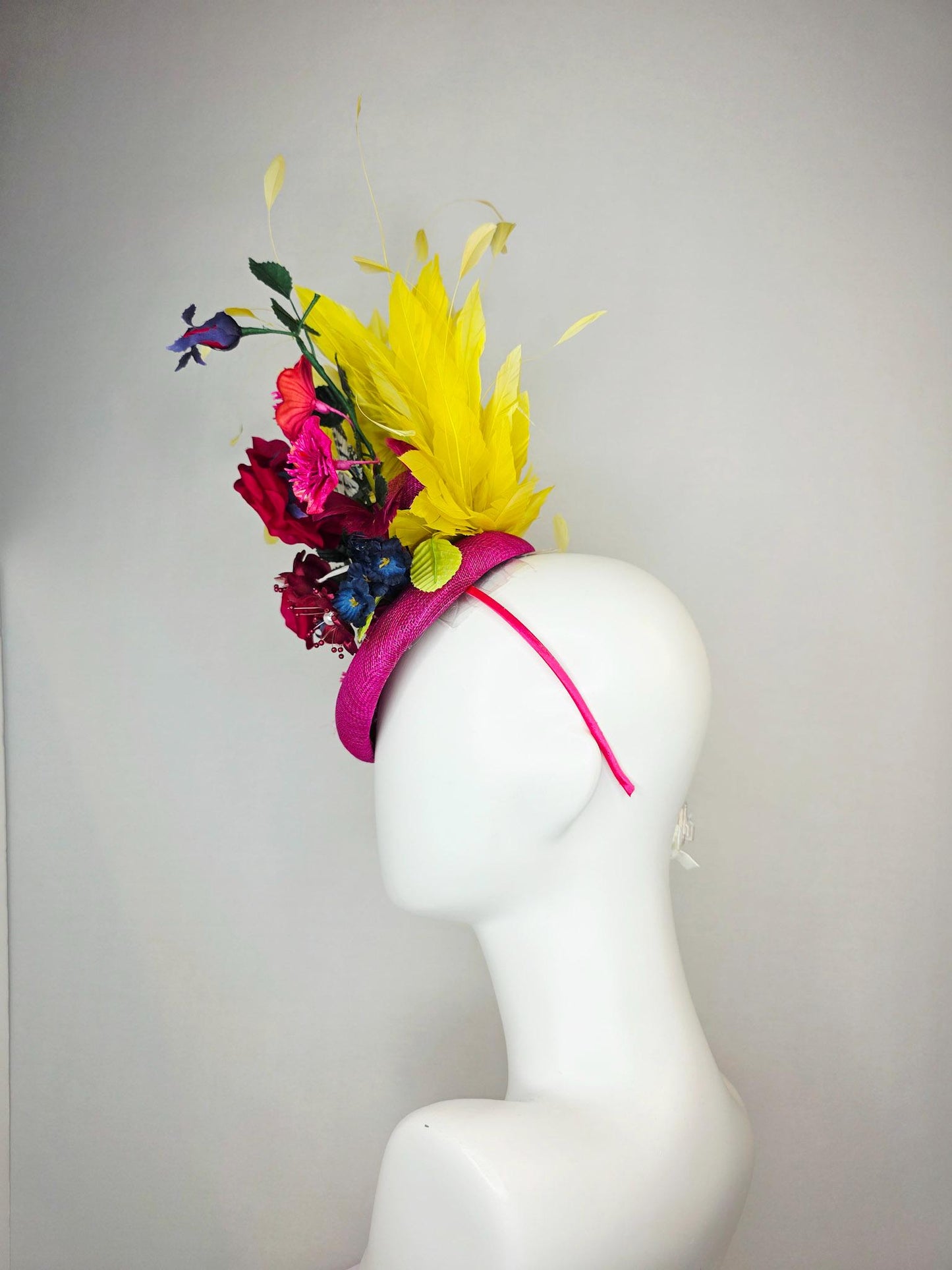kentucky derby hat fascinator pink sinamay red satin roses fuchsia navy blue burgundy flowers dark green leaves yellow feathers butterfly