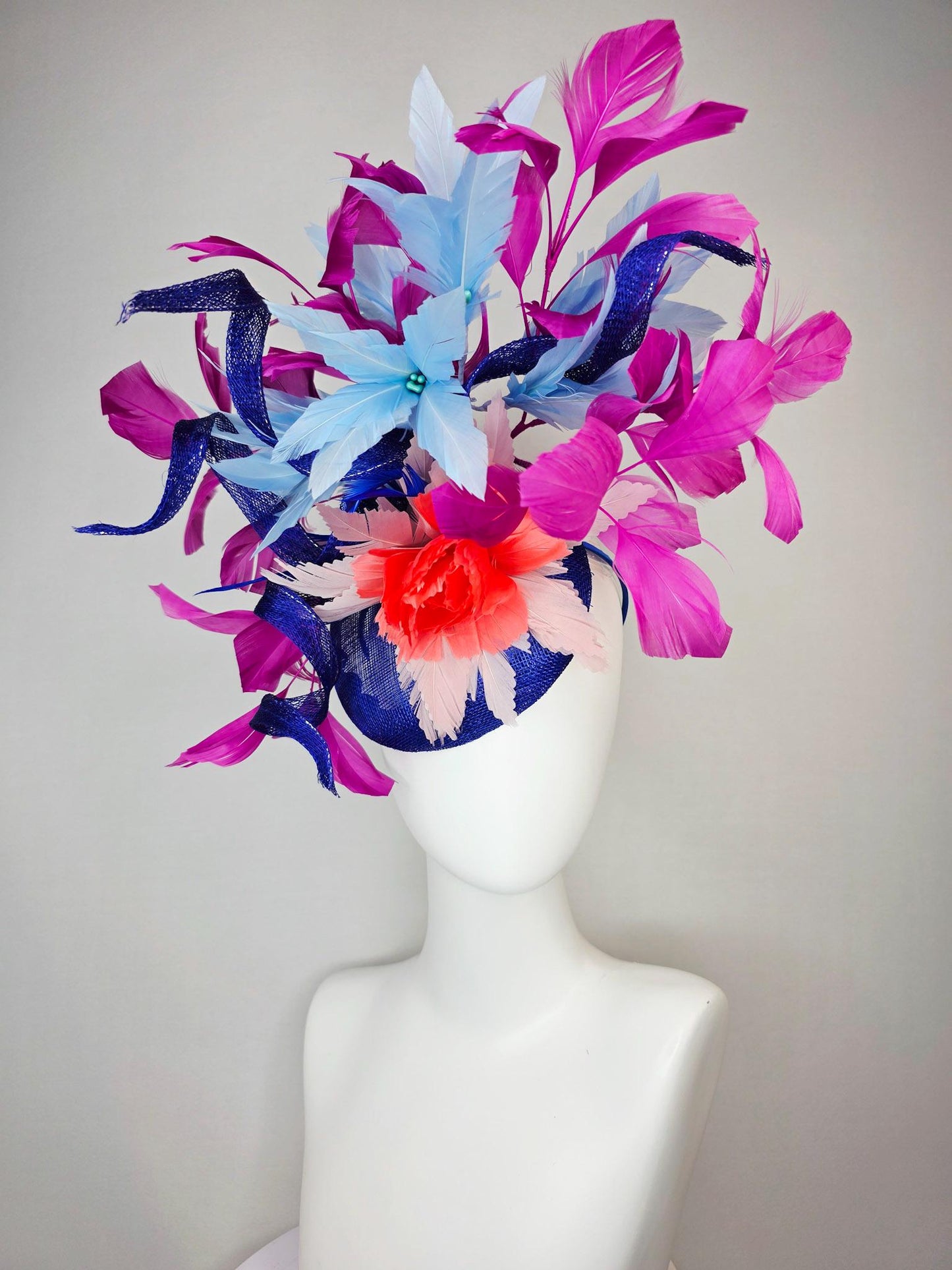 kentucky derby hat fascinator cobalt blue sinamay with curls coral red and sky light blue feather flowers magenta pink branching feathers