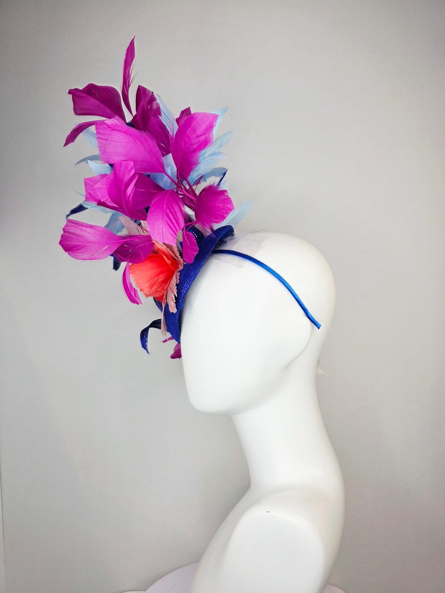 kentucky derby hat fascinator cobalt blue sinamay with curls coral red and sky light blue feather flowers magenta pink branching feathers