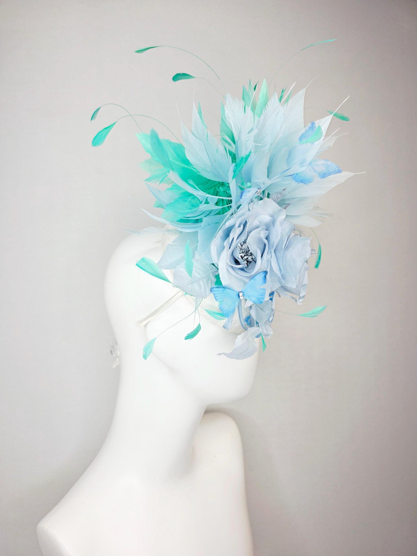 kentucky derby hat fascinator white satin with netting light blue organza rose light blue green mint aqua feathers sky blue butterflies