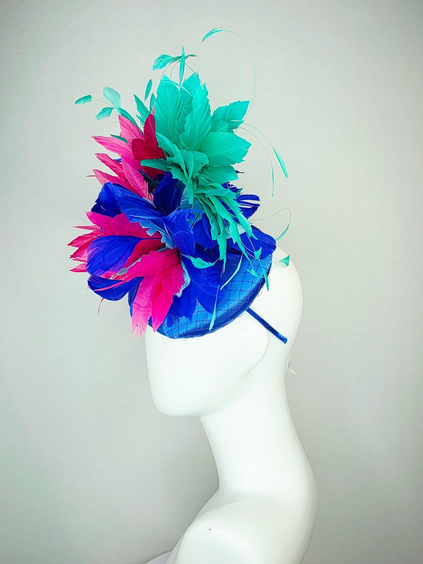 kentucky derby hat fascinator cobalt royal blue satin with netting pink feather flowers cobalt blue and mint aqua green branching feathers