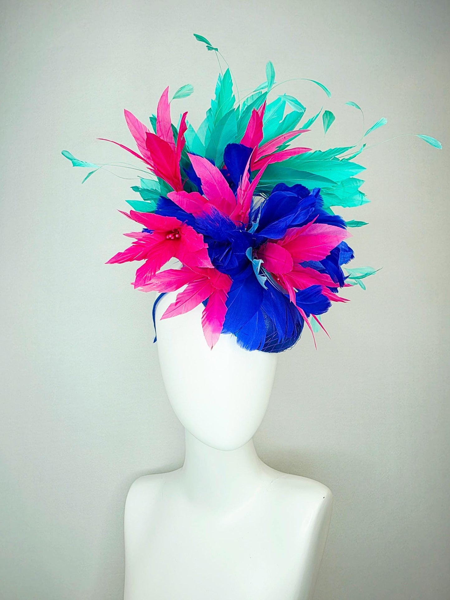 kentucky derby hat fascinator cobalt royal blue satin with netting pink feather flowers cobalt blue and mint aqua green branching feathers