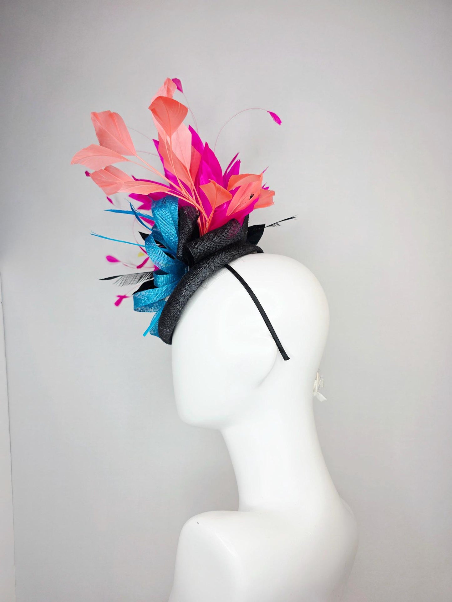 kentucky derby hat fascinator colorful black sinamay with turquoise blue sinamay bow and black yellow peach orange and hot pink feathers