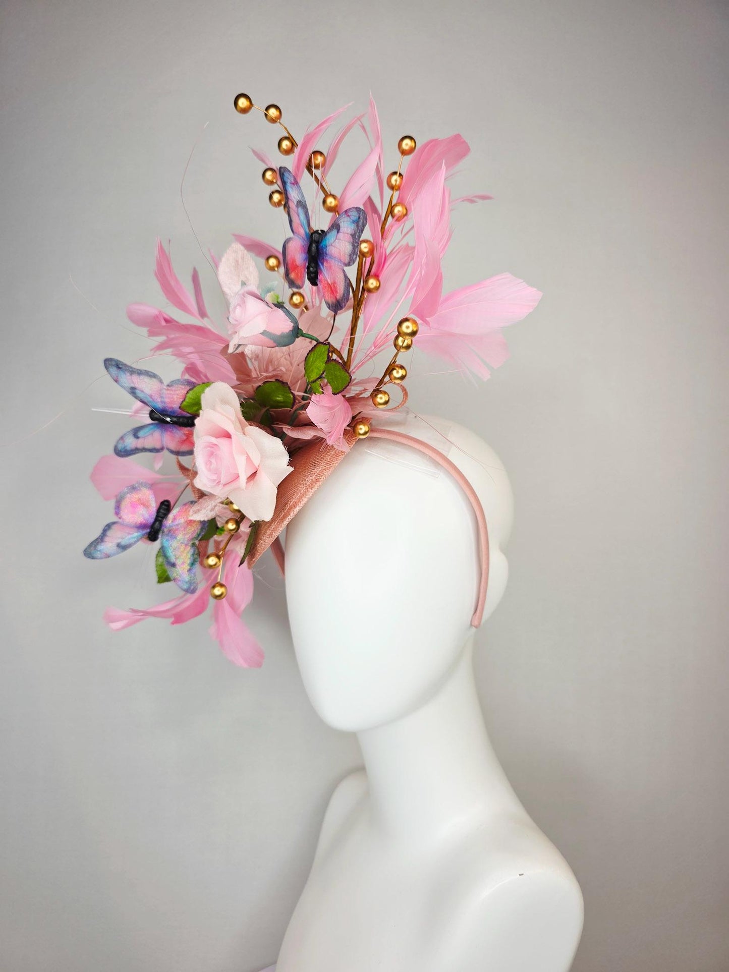 kentucky derby hat fascinator light pink satin rose green leaves dusty rose and baby blush pink feathers gold pearls pink blue butterflies