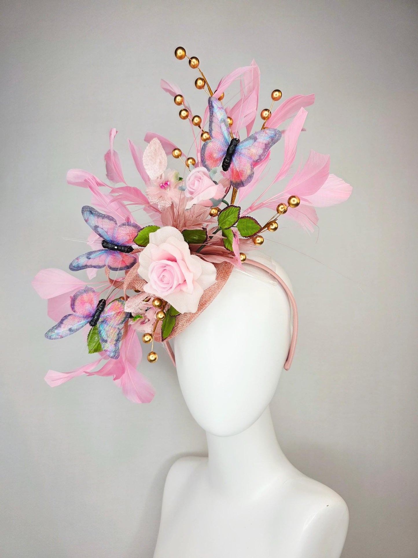 kentucky derby hat fascinator light pink satin rose green leaves dusty rose and baby blush pink feathers gold pearls pink blue butterflies