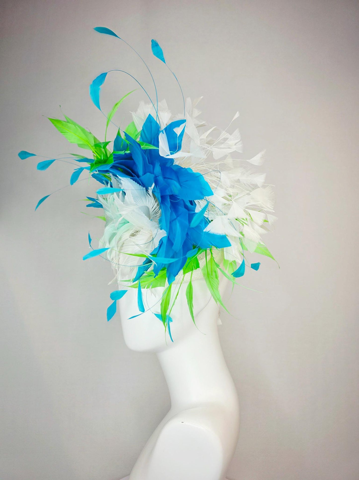 kentucky derby hat fascinator white light mint feather flower with turquoise blue lime green and white branching feathers