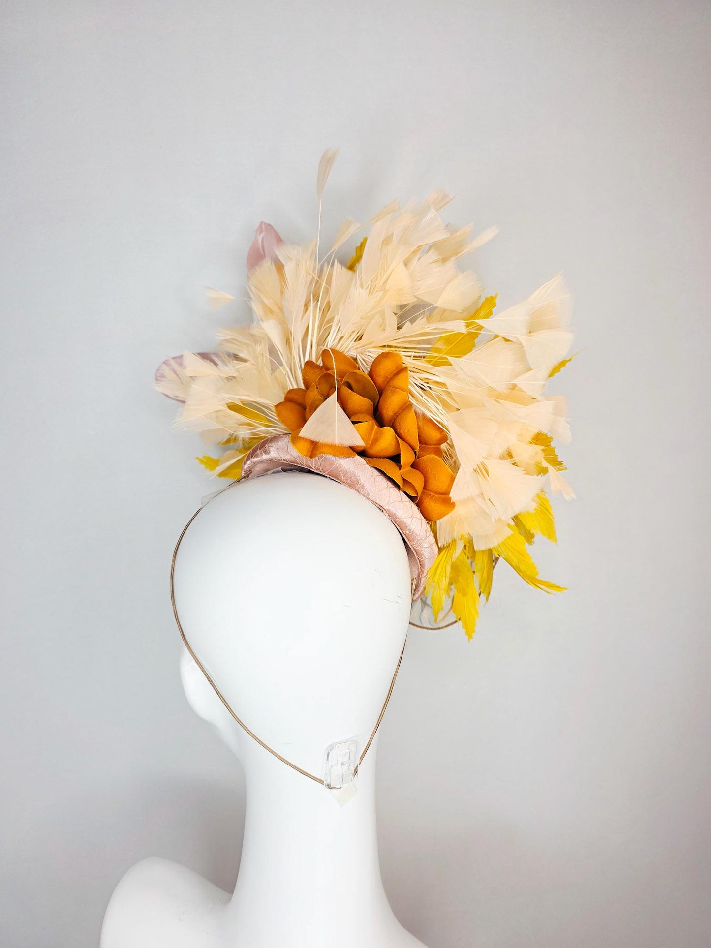 kentucky derby hat fascinator champagne pink satin with netting with large gold organza flower and mustard yellow cream beige feathers