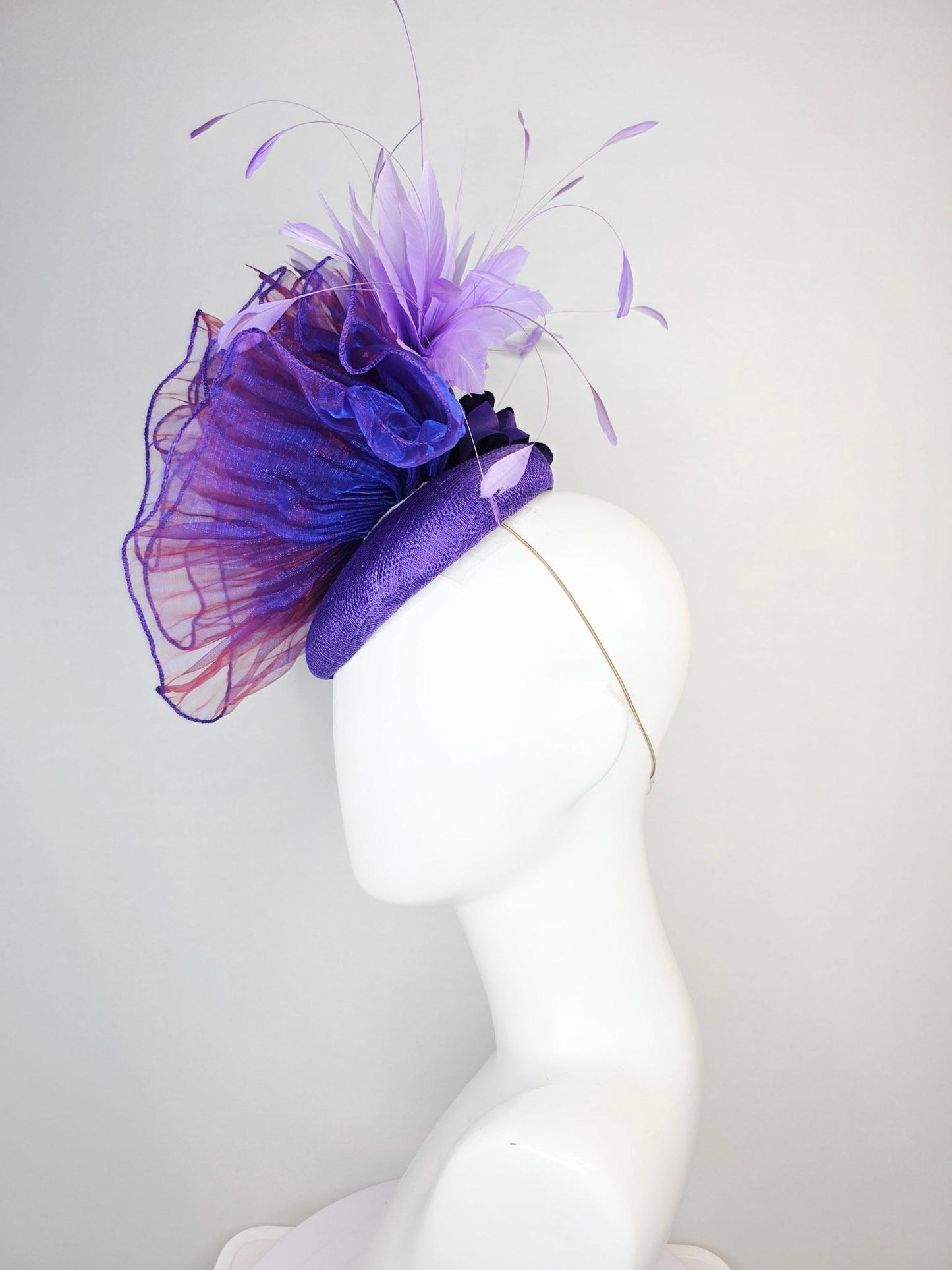 kentucky derby hat fascinator purple sinamay with large purple blue organza flower lavender and violet purple branching feathers