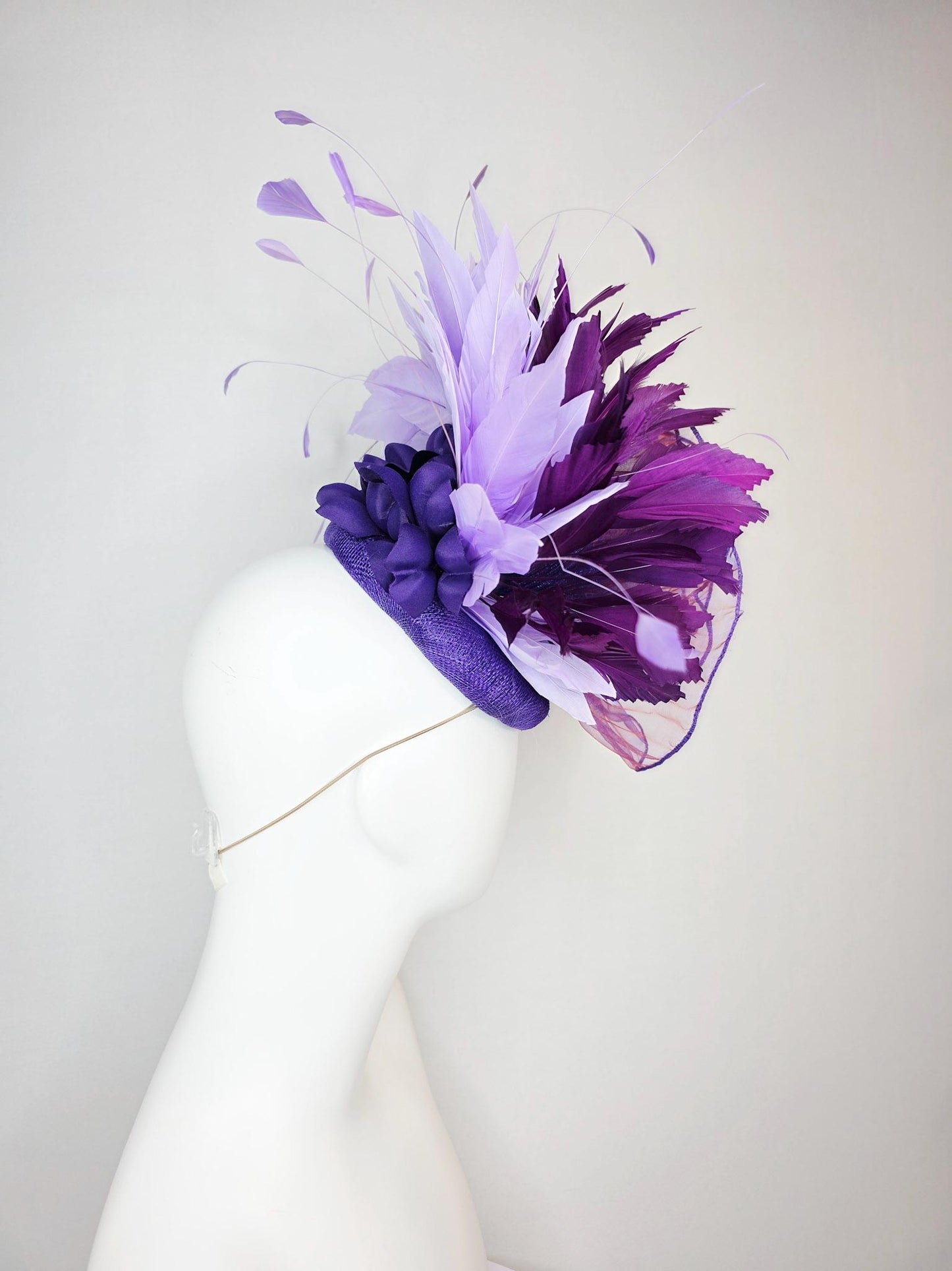 kentucky derby hat fascinator purple sinamay with large purple blue organza flower lavender and violet purple branching feathers