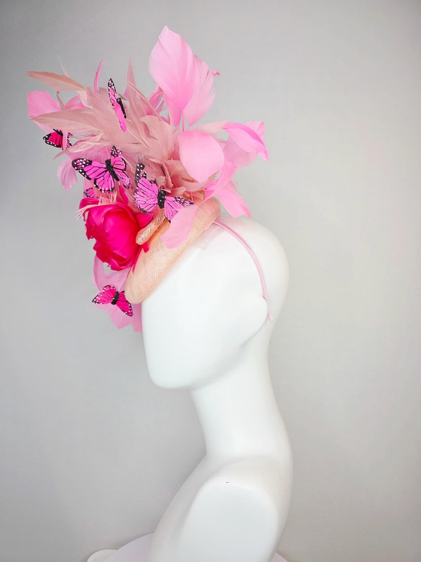 kentucky derby hat fascinator champagne pink sinamay with hot pink feather flower dusty rose and blush pink feathers and pink butterflies