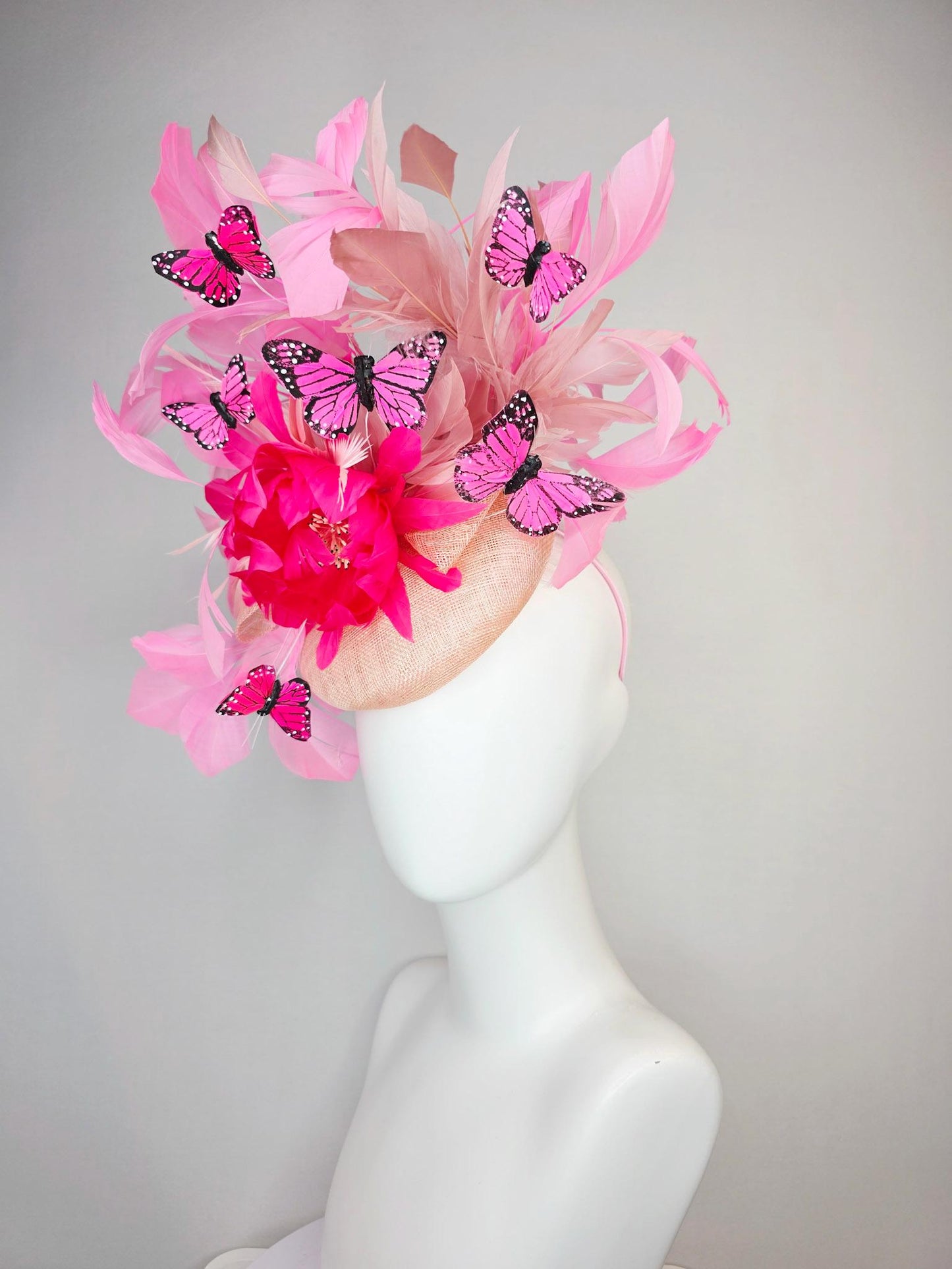 kentucky derby hat fascinator champagne pink sinamay with hot pink feather flower dusty rose and blush pink feathers and pink butterflies