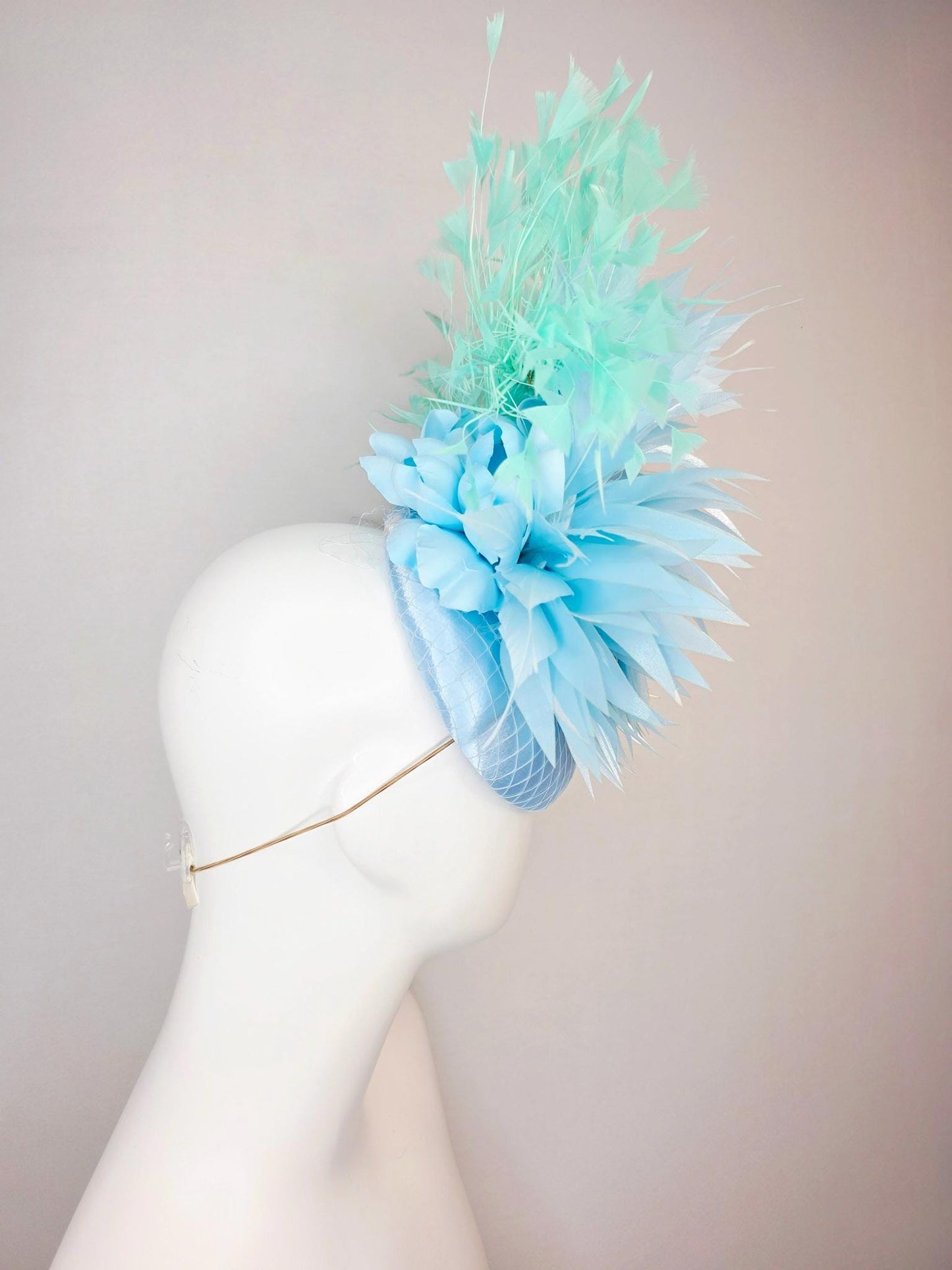 kentucky derby hat fascinator light baby blue satin with netting fluffy sky blue feathers and mint green branching feathers