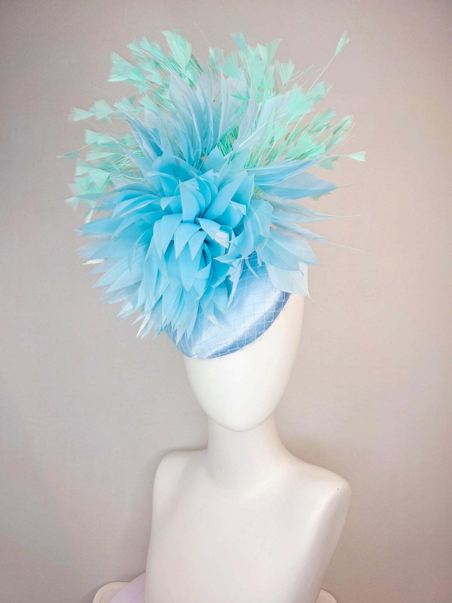kentucky derby hat fascinator light baby blue satin with netting fluffy sky blue feathers and mint green branching feathers