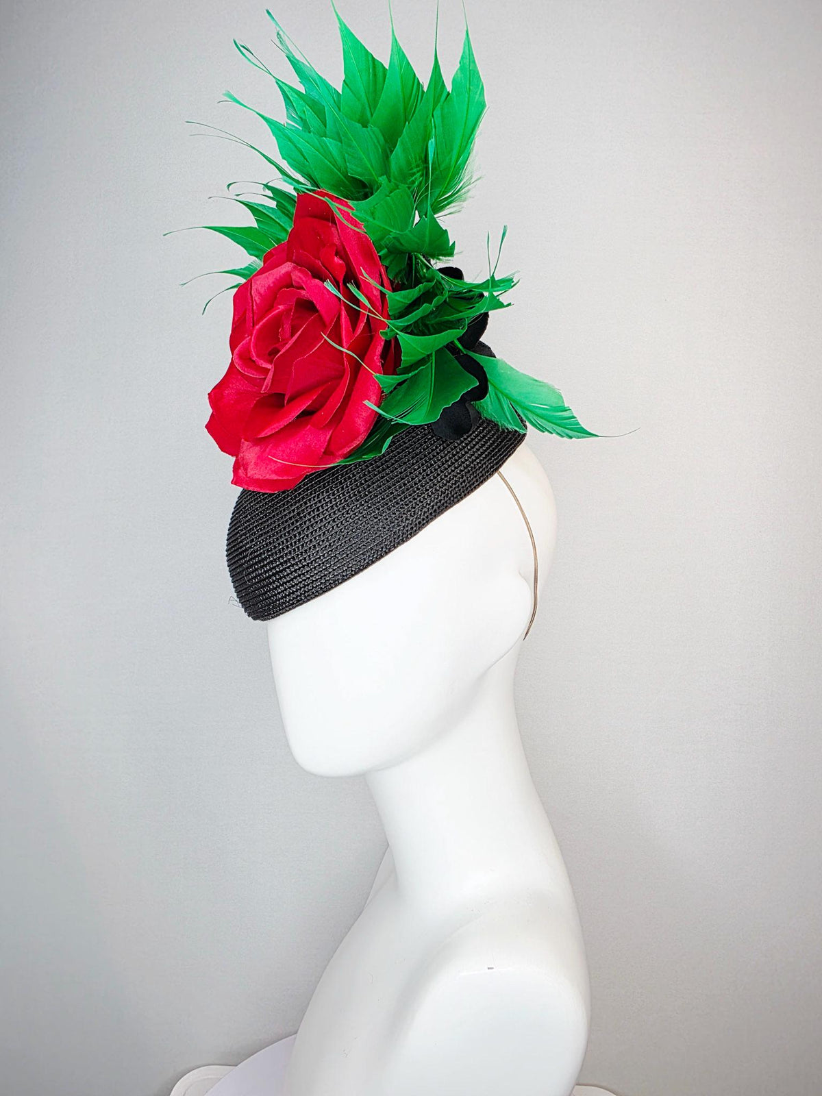 kentucky derby hat fascinator black straw base with large cherry red satin rose and bright green branching feathers