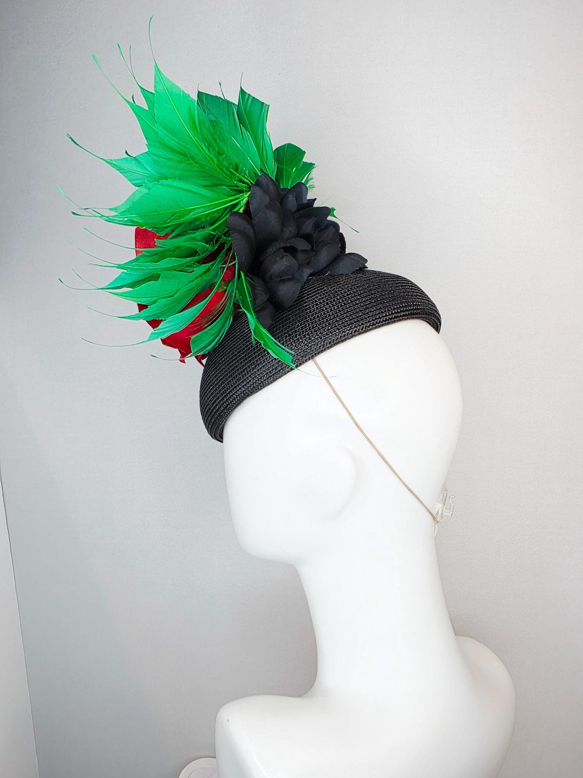 kentucky derby hat fascinator black straw base with large cherry red satin rose and bright green branching feathers