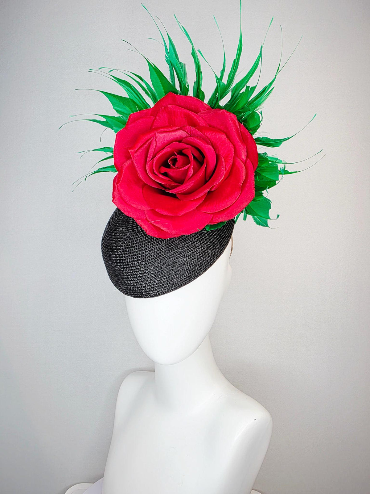 kentucky derby hat fascinator black straw base with large cherry red satin rose and bright green branching feathers