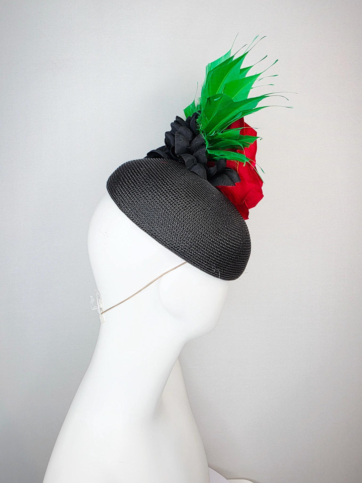 kentucky derby hat fascinator black straw base with large cherry red satin rose and bright green branching feathers