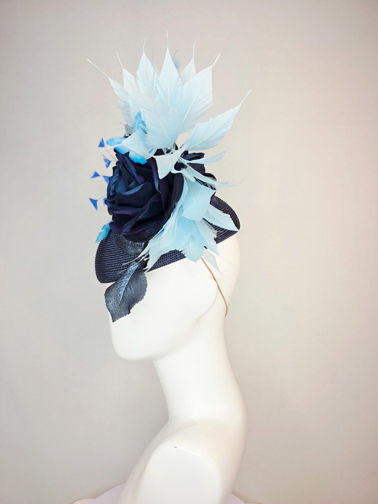 kentucky derby hat fascinator navy blue straw base large navy blue silk rose black leaves sky and baby blue feathers blue butterflies