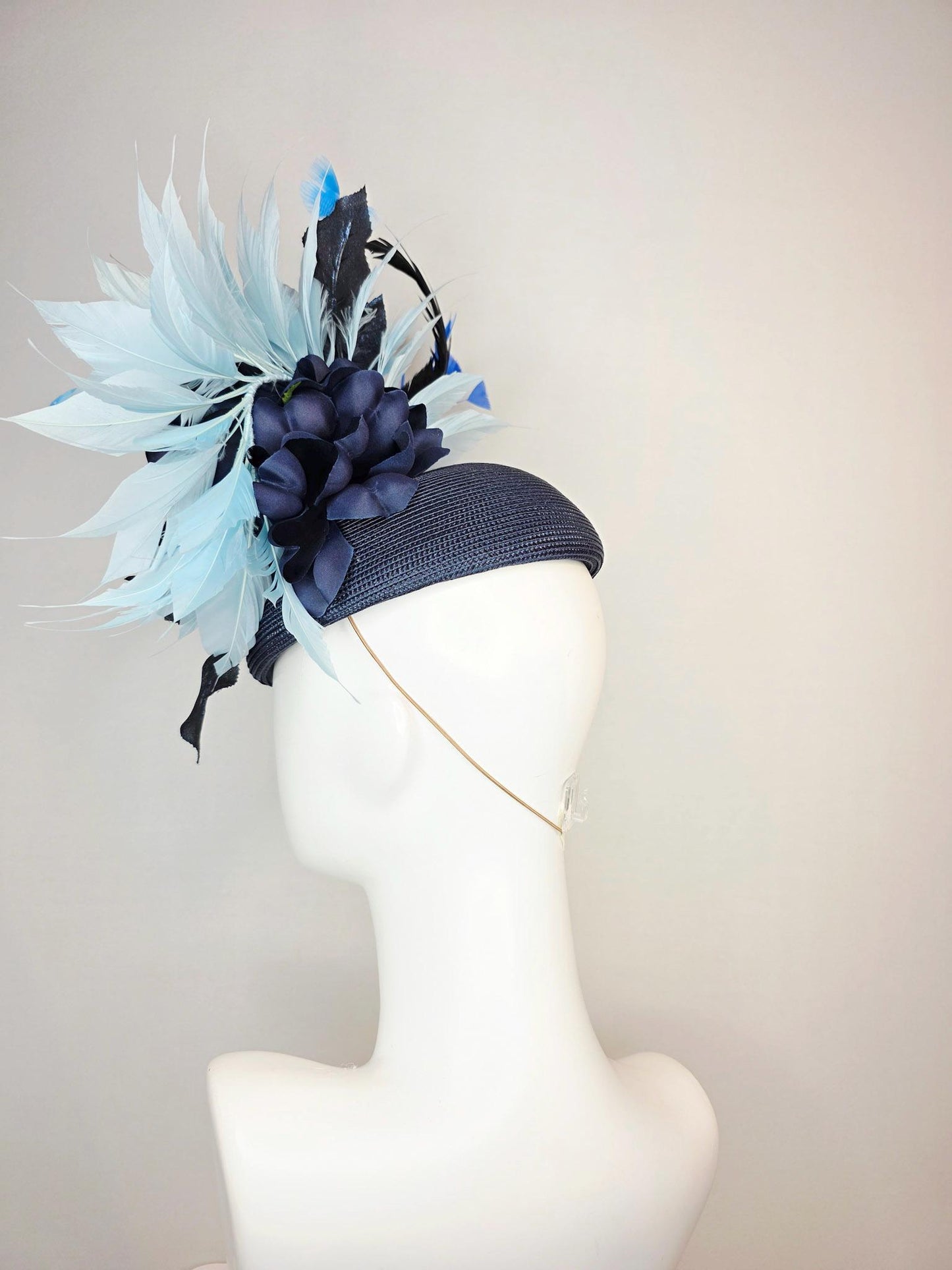 kentucky derby hat fascinator navy blue straw base large navy blue silk rose black leaves sky and baby blue feathers blue butterflies