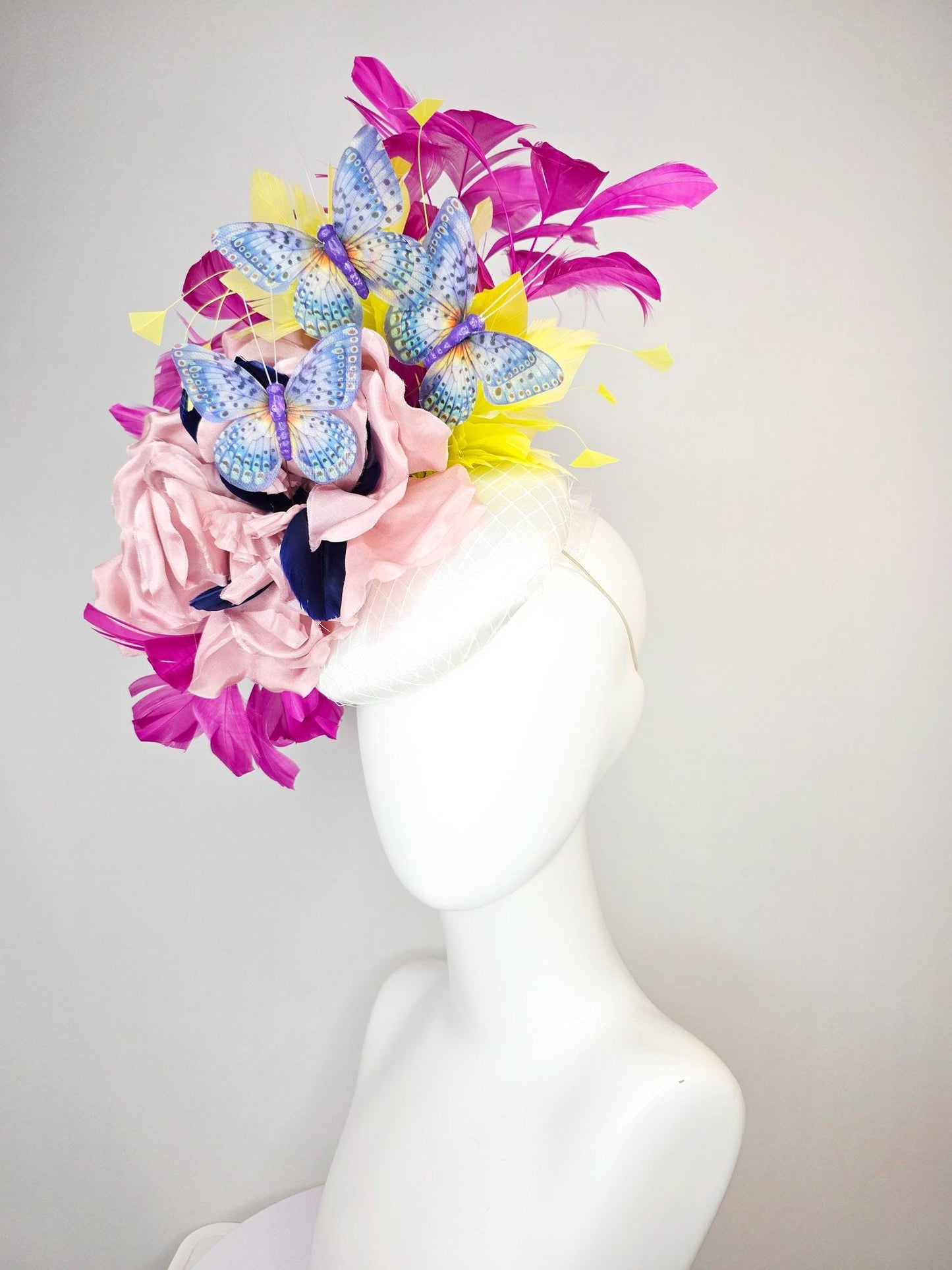 kentucky derby hat fascinator white silk with netting light pink silk roses yellow and magenta purple feathers and purple blue butterflies